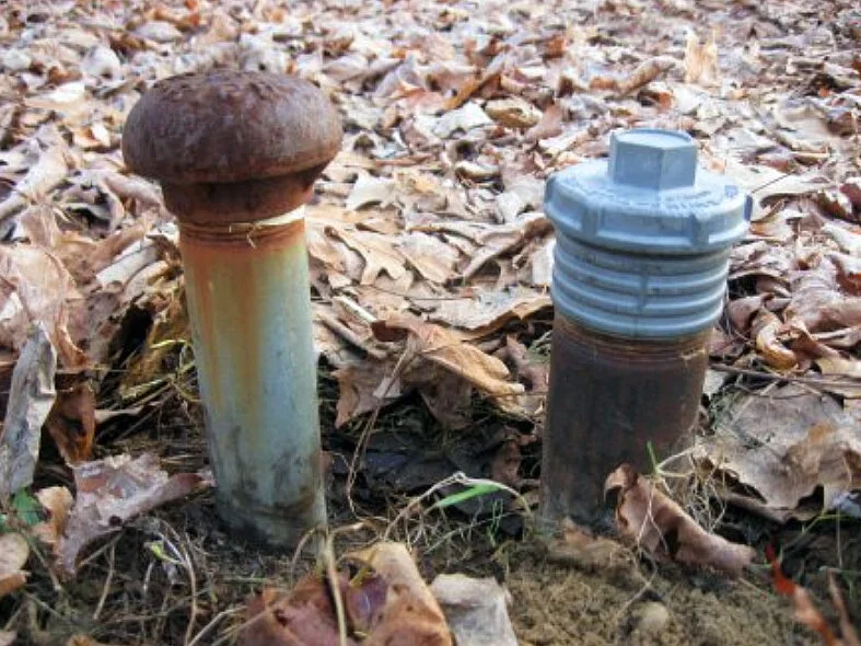 oil_furnace_pipes_in_yard.jpg