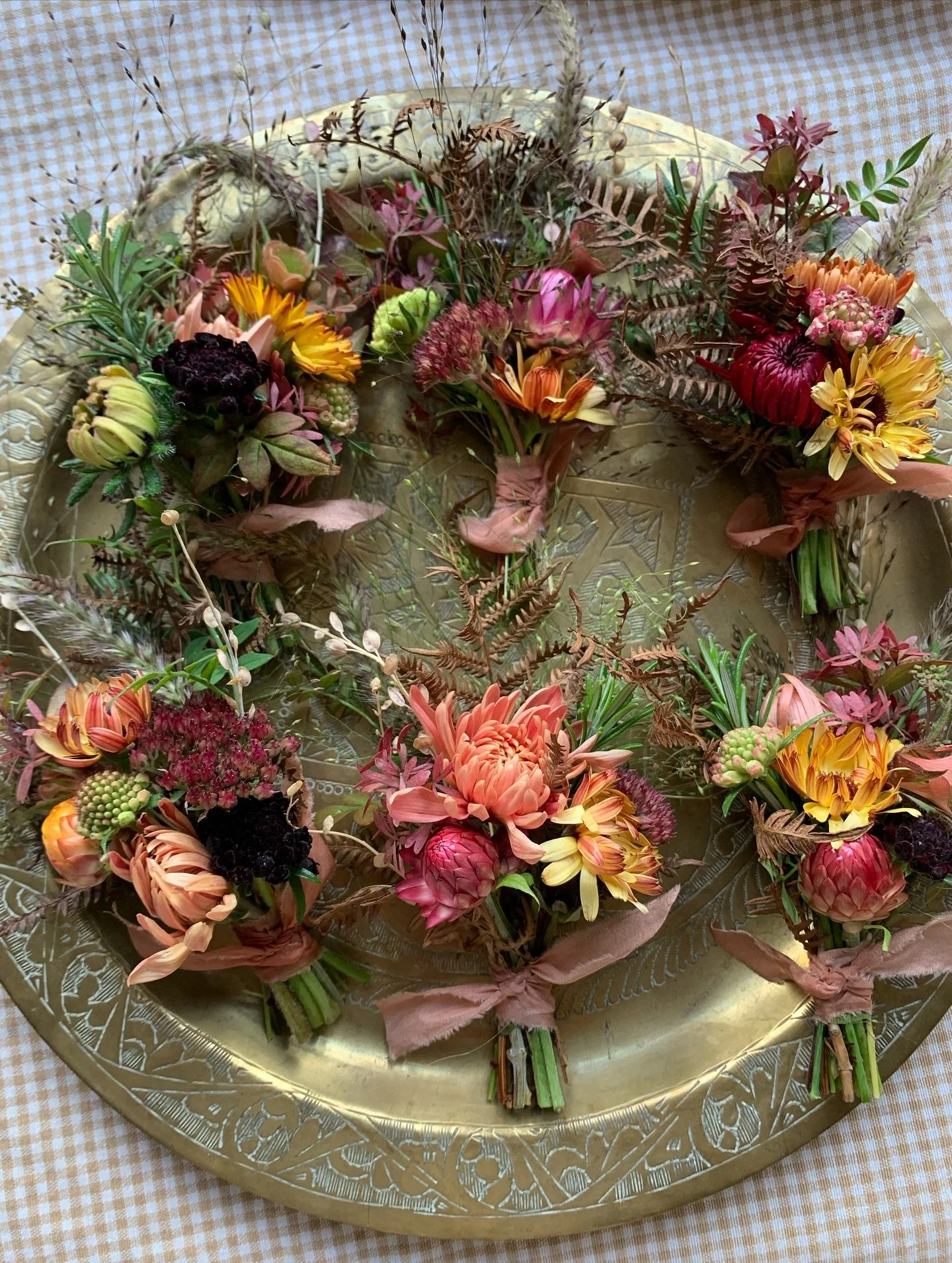 Small &amp; perfectly formed.  There&rsquo;s something about making buttonholes that is so utterly charming, like little doll bouquets. Carried close to your heart, each ingredient is selected with care to add a bit of softness here, a bright splash 