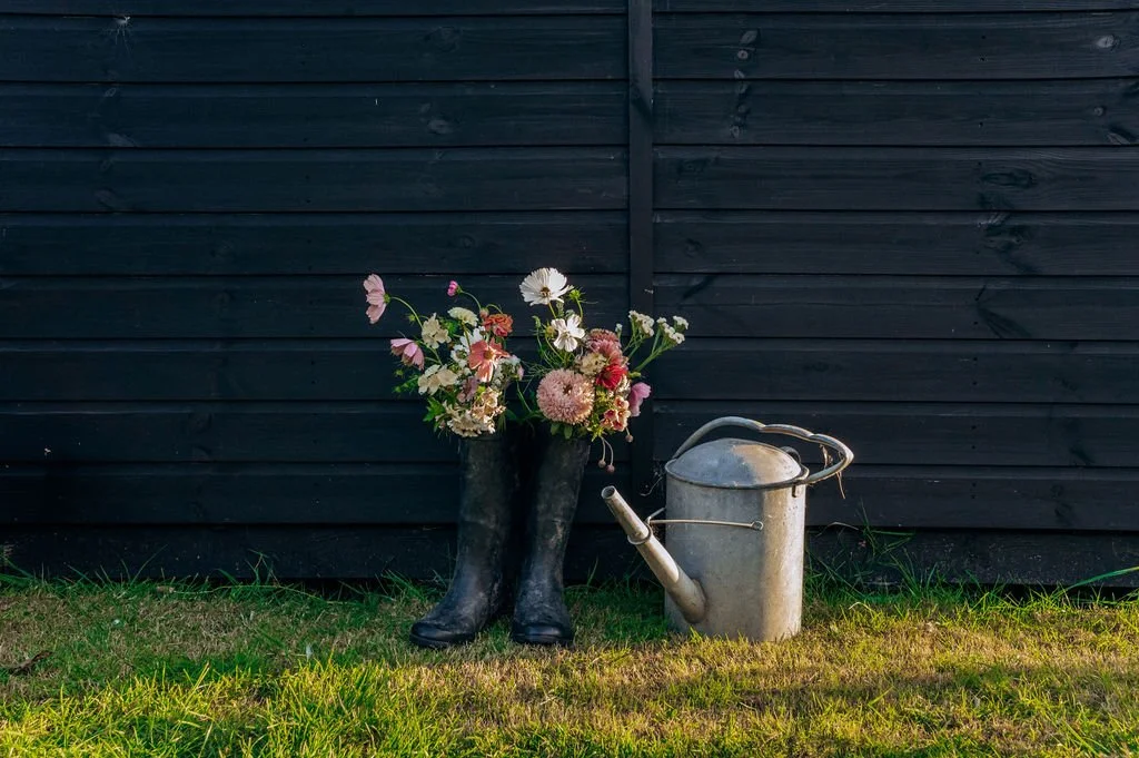 Devon grown funeral flowers natural, wild and sustainably arranged. Flowers in wellington boots
