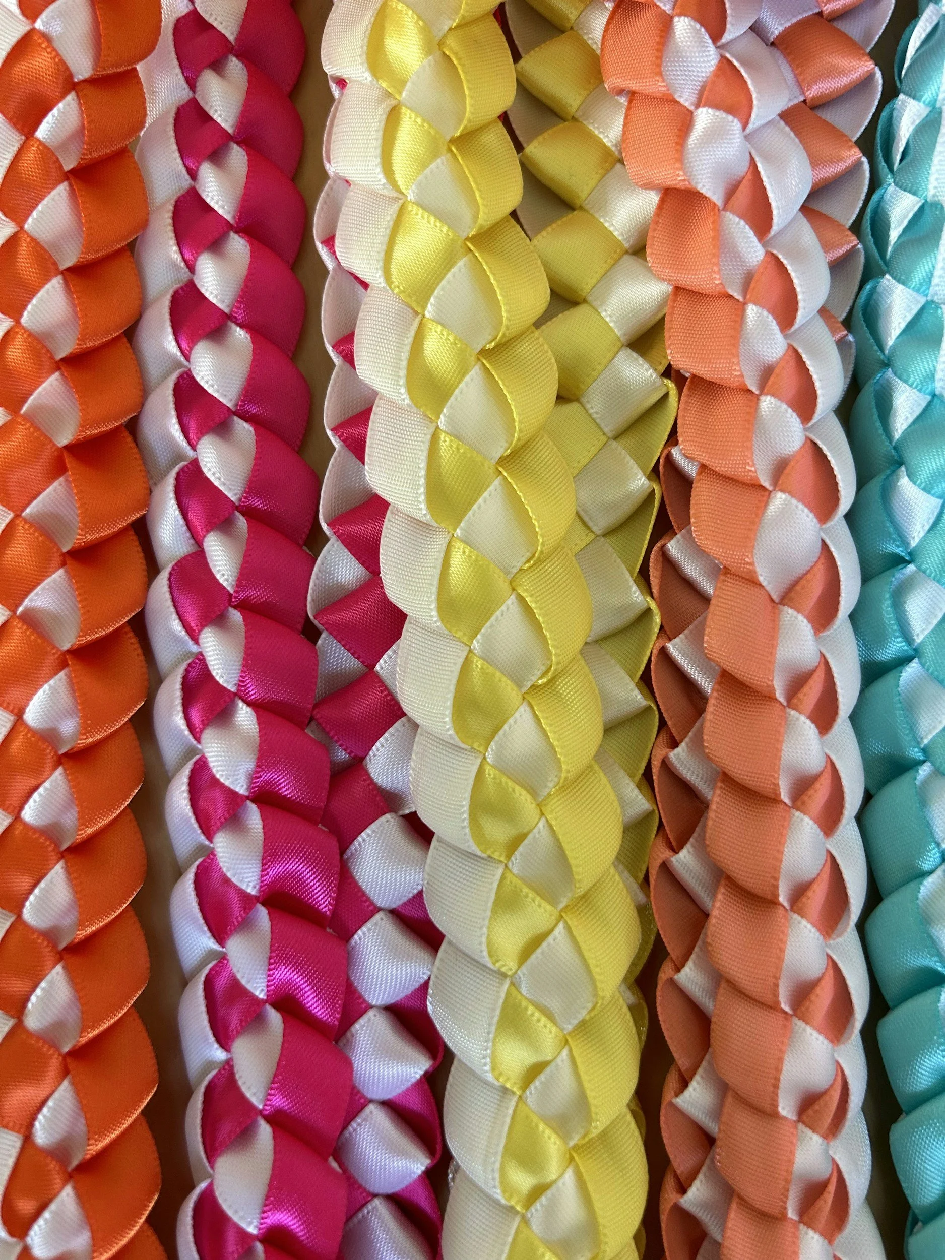 Colorful ribbons woven together during a joyful maypole celebration