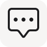 Simplified black and white icon of a chat bubble.