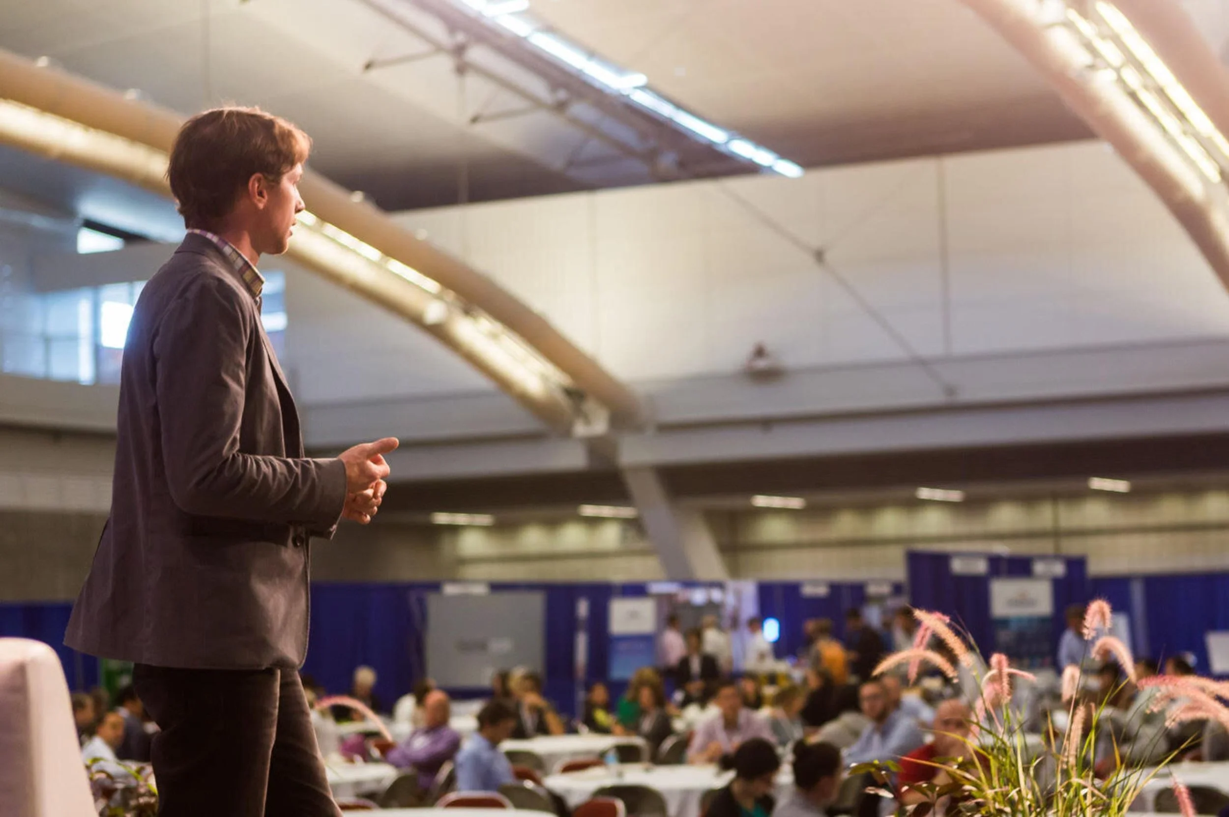 Tristan speaking at a conference