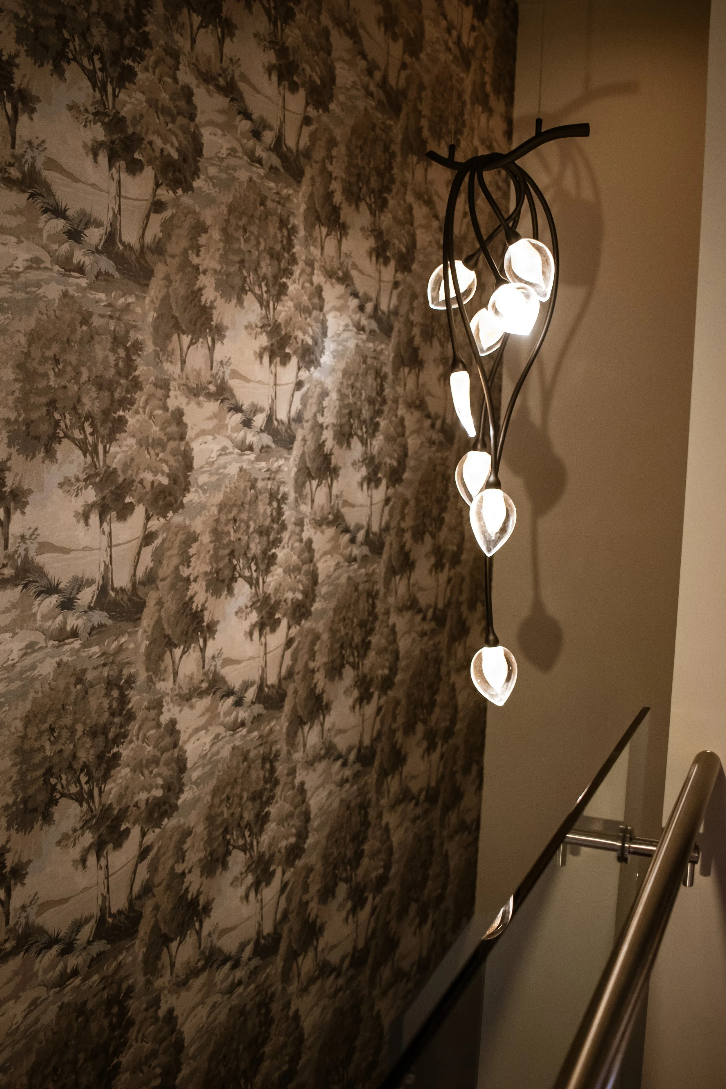 Hanging Industrial Light Fixture Over Staircase