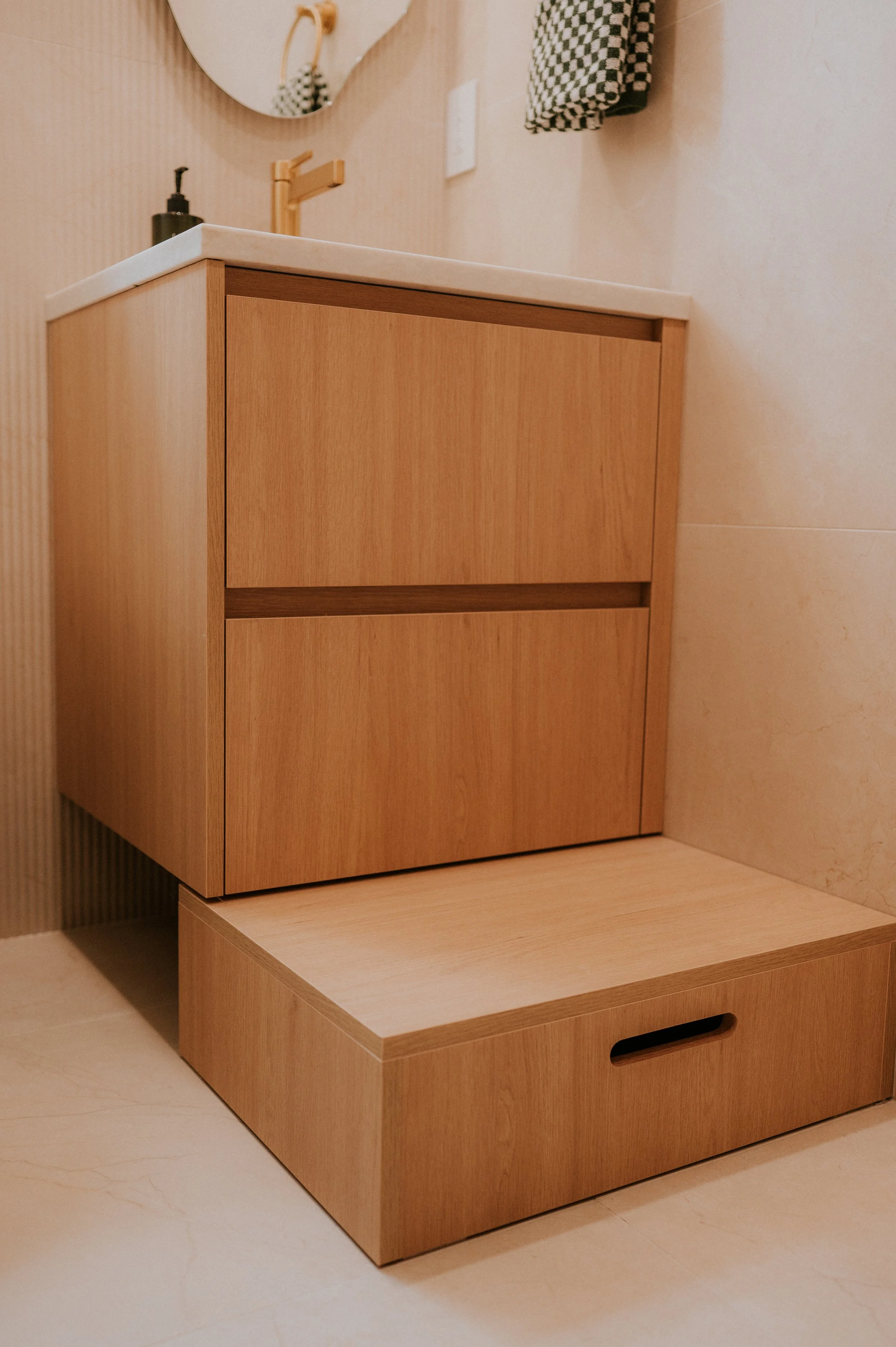 Custom Bathroom Vanity Millwork with Pull-Out Kids Step Stool