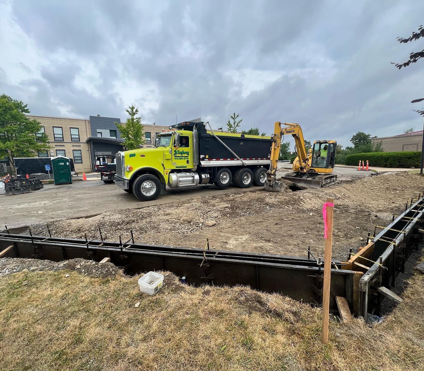 Rhea performs engineering oversight for a variety of civil construction projects for schools, local municipalities, and airports. 

Check out the curb being built in a new parking area that will provide this school seven additional parking spaces.