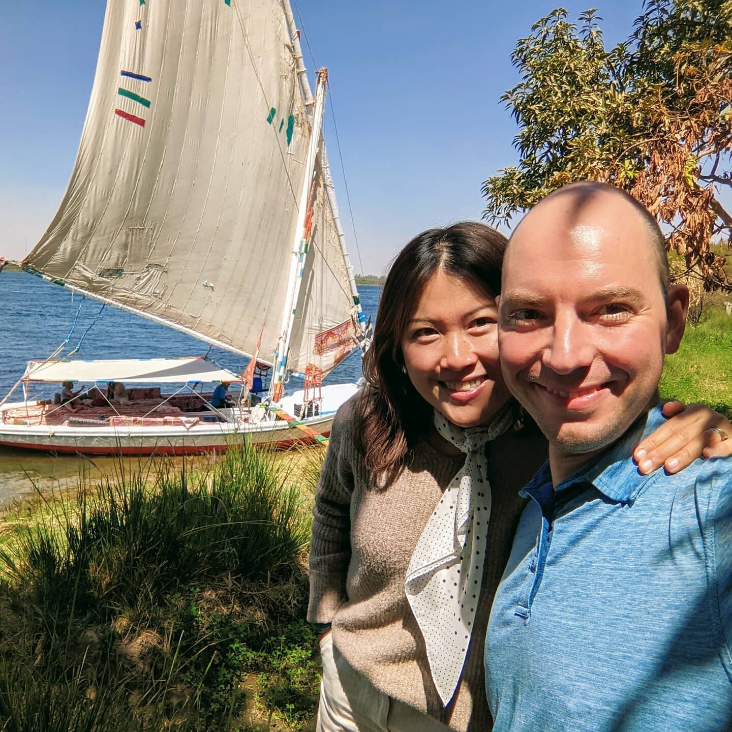 Sailing Down the Nile - Once in your life, sail down the Nile on a traditional Egyptian felucca sailboat!

You spend your day relaxing on a large mattress, shielded by a sunroof, feeling the gentle warm air caress you, listening to the river lap agai