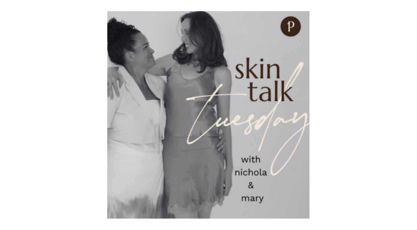 Black and white photo of two women smiling and looking at each other, one with curly hair and the other with straight hair, standing close together with their arms around each other. Overlaid text reads 'skin talk Tuesday with nichola & mary.'