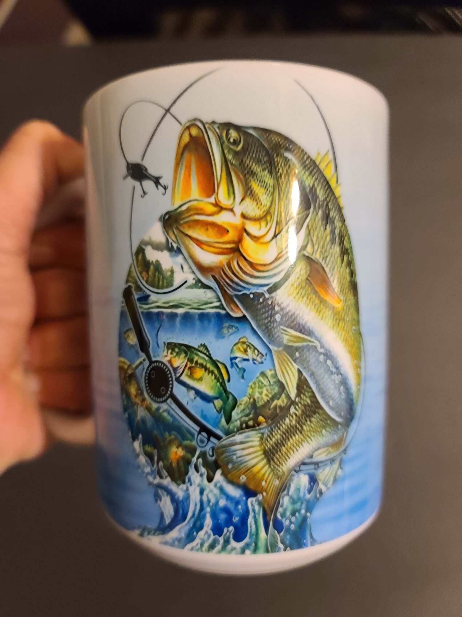 Hand Holding Largemouth Bass Coffee Mug by Thomas Young - Pixels