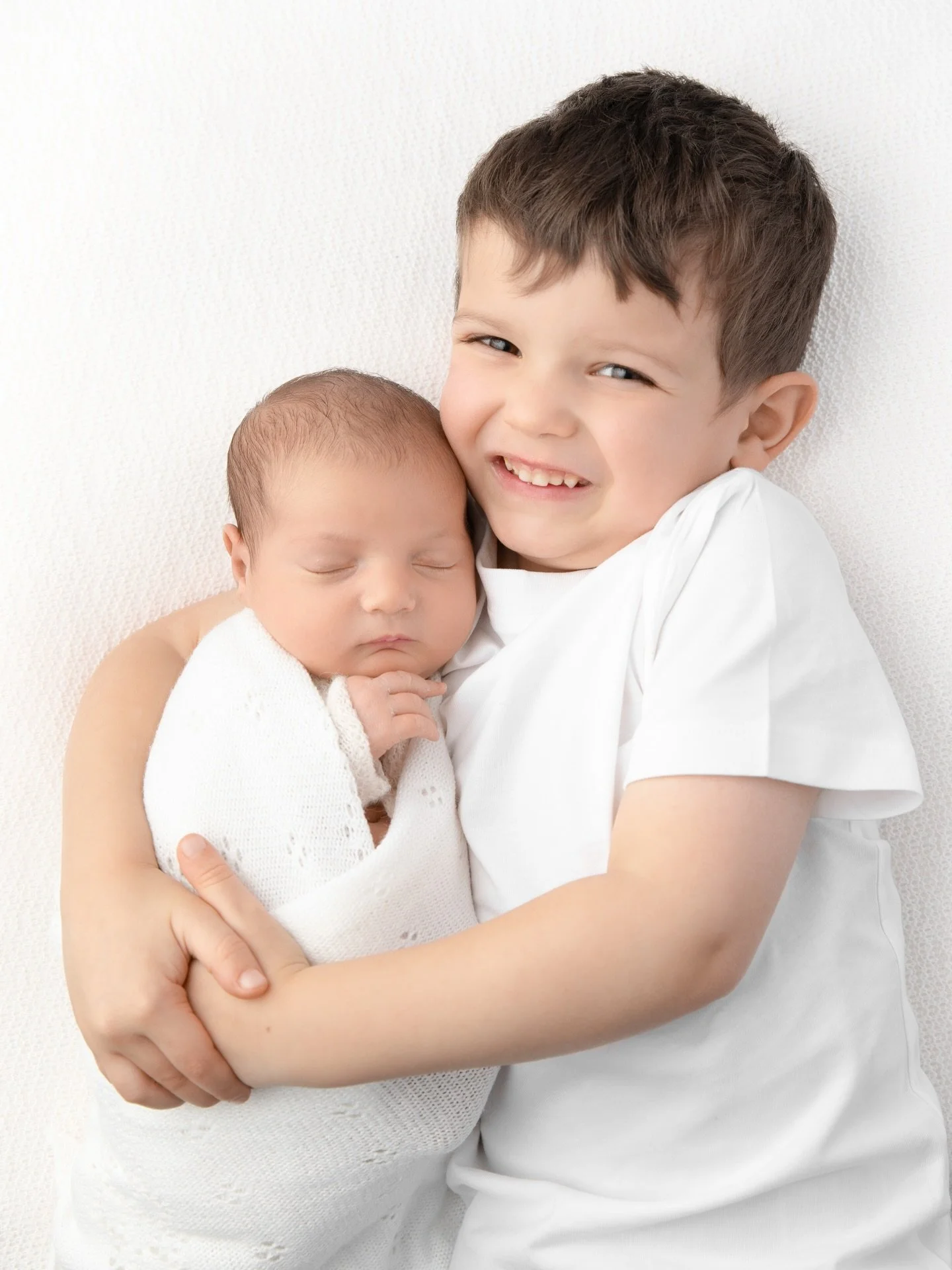I first photographed Seth 4 years ago at his newborn session &amp; I must have photographed him at-least 10 times since then for his birthday, every Christmas, plus family sessions &amp; more recently with his new baby sister - how happy &amp; proud 