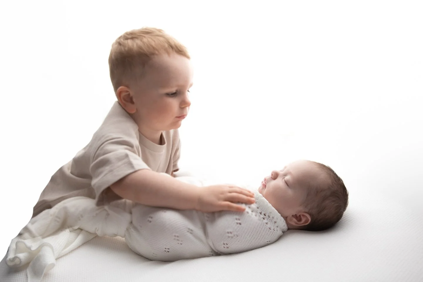 Great example of Instagram vs reality from yesterday&rsquo;s session with big brother Reggie &amp; his new baby sister Margot (swipe to see the unedited version), who insisted that the whole cast of Toy Story joined in for his sibling photos, absolut