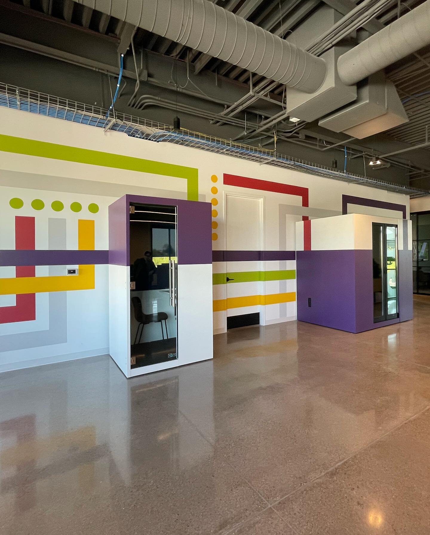 ➡️ for the before. 

For this wall we wanted to bring in color, integrate the phone booths into the art and provide wayfinding for guests. 

I like to call this one &ldquo;Chatty Cathy&rdquo; for all those loud talkers in the office that need a place