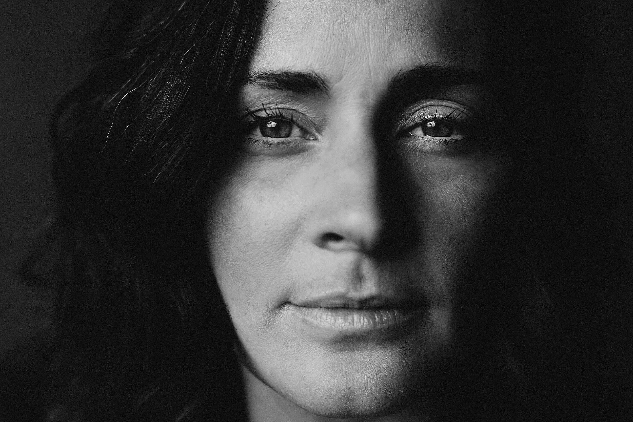 Black and white portrait that is close up.