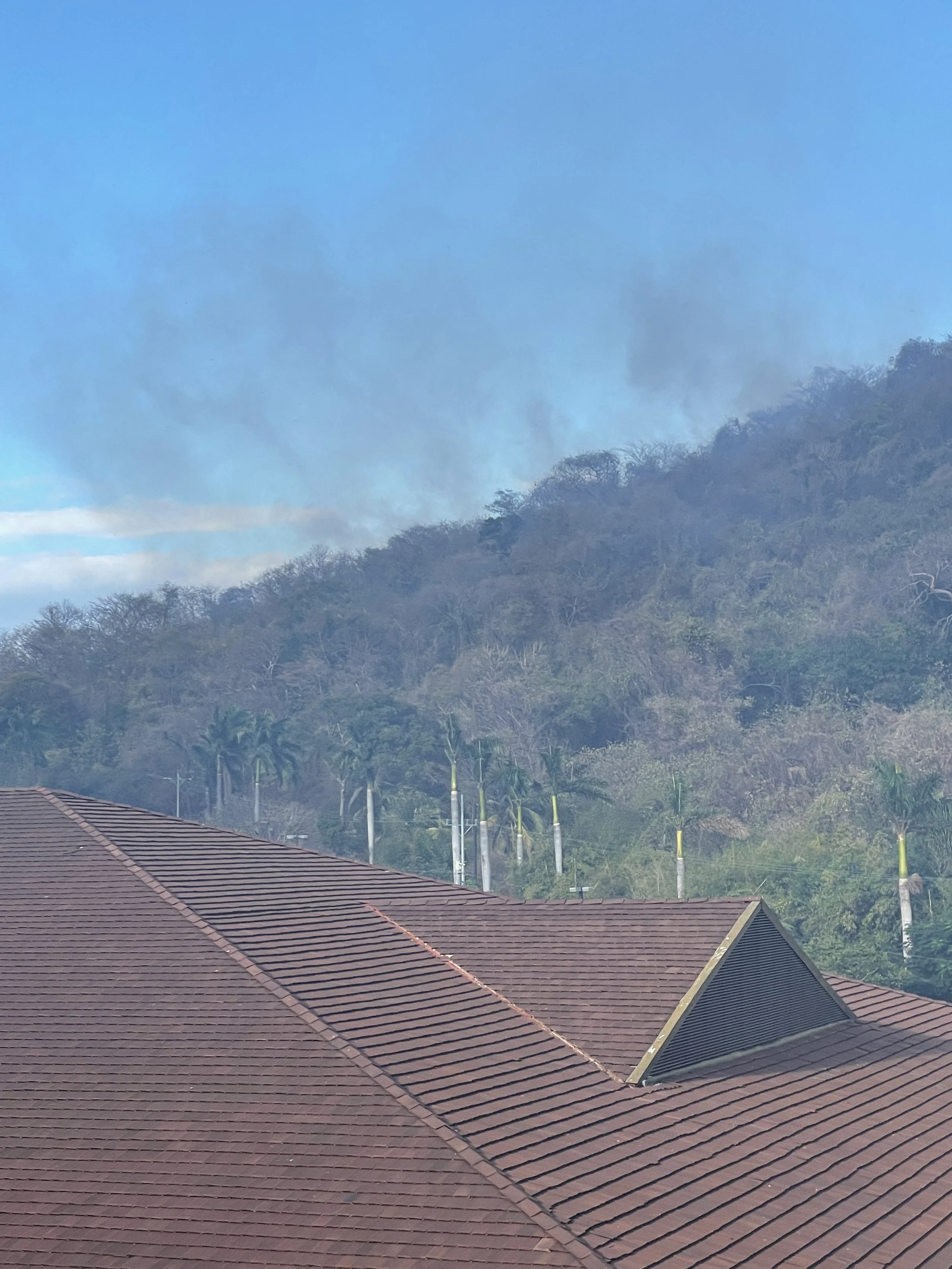 Fire on the hill caused a ton of smoke the first night at our new hotel in Las Mareas.  Luckily we awoke the next day and it was gone. 