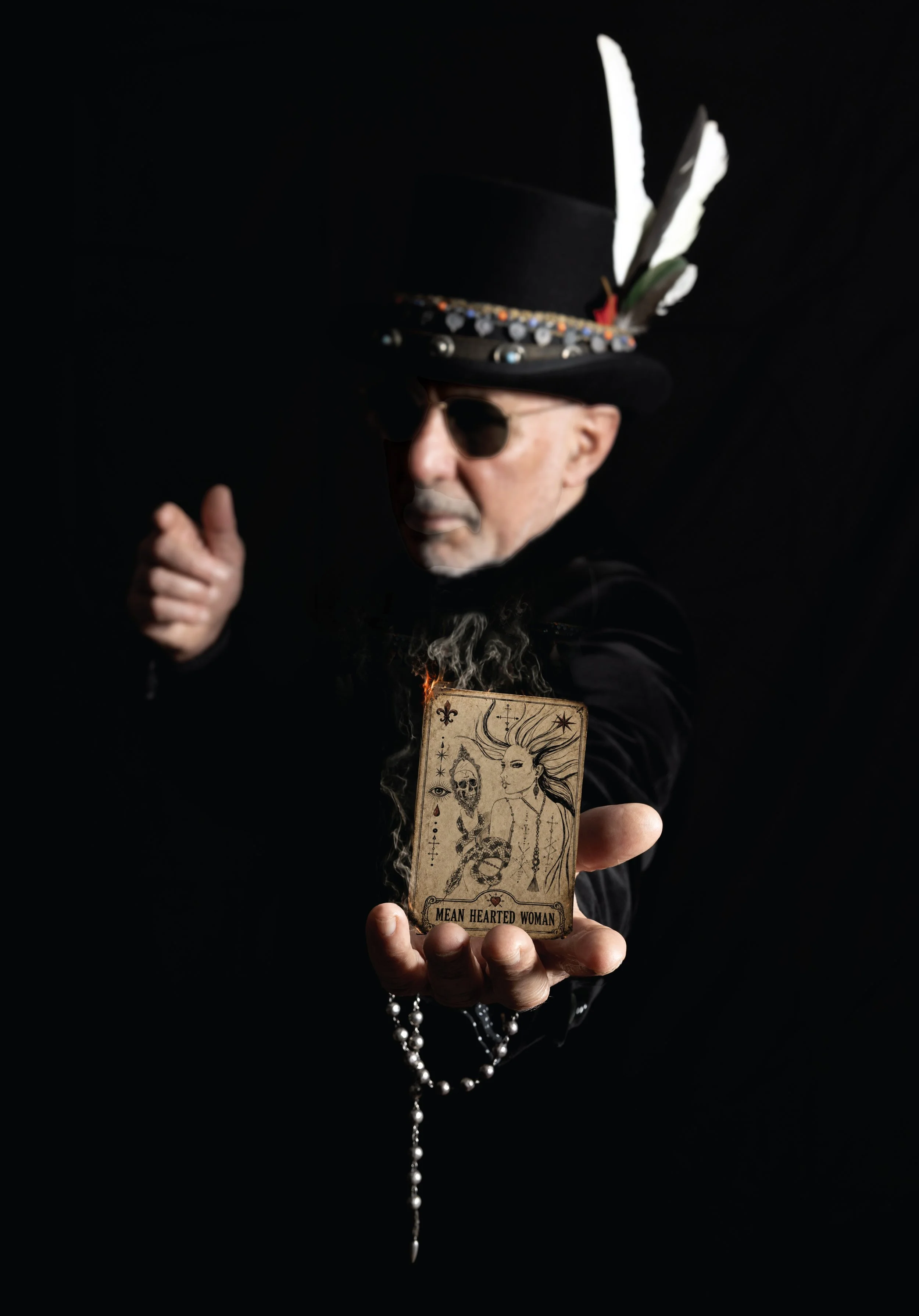 Rick Melick holding the Mean Hearted Woman artwork, the first single from the Voodoo album