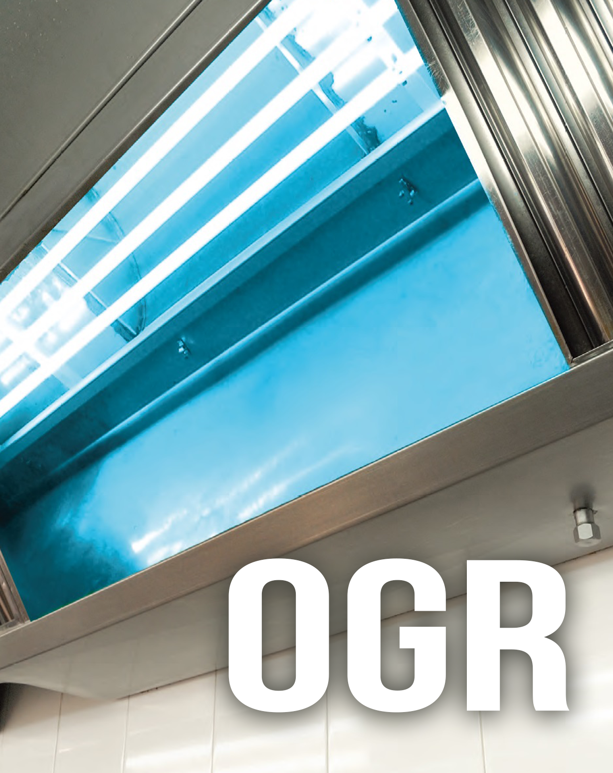 Close-up shot of a kitchen hood with Odor And Grease Removal installed.