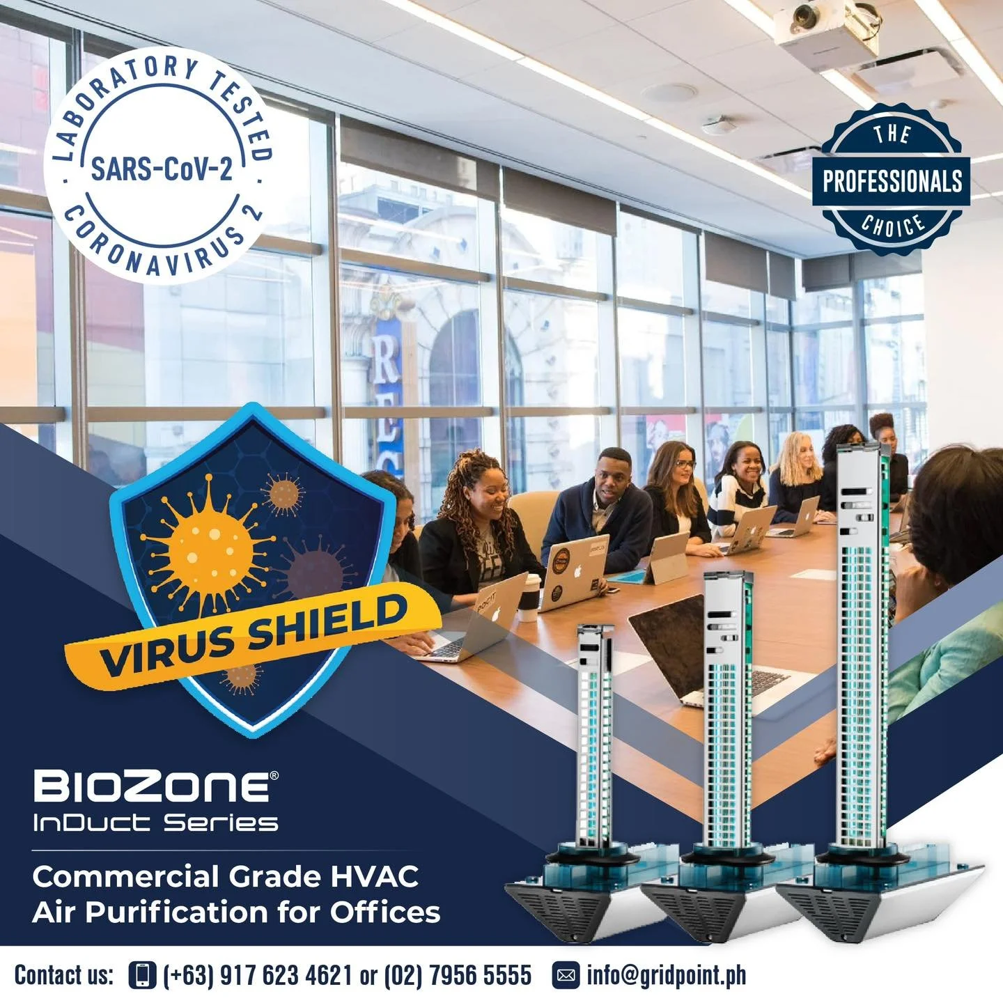 Indoor office meeting with people sitting at a long table using laptops, large glass windows in background, promotional overlay for virus protection products, including a shield with virus icons labeled "VIRUS SHIELD," and images of HVAC air purifiers, advertising BioZone InDuct Series for HVAC air purification.