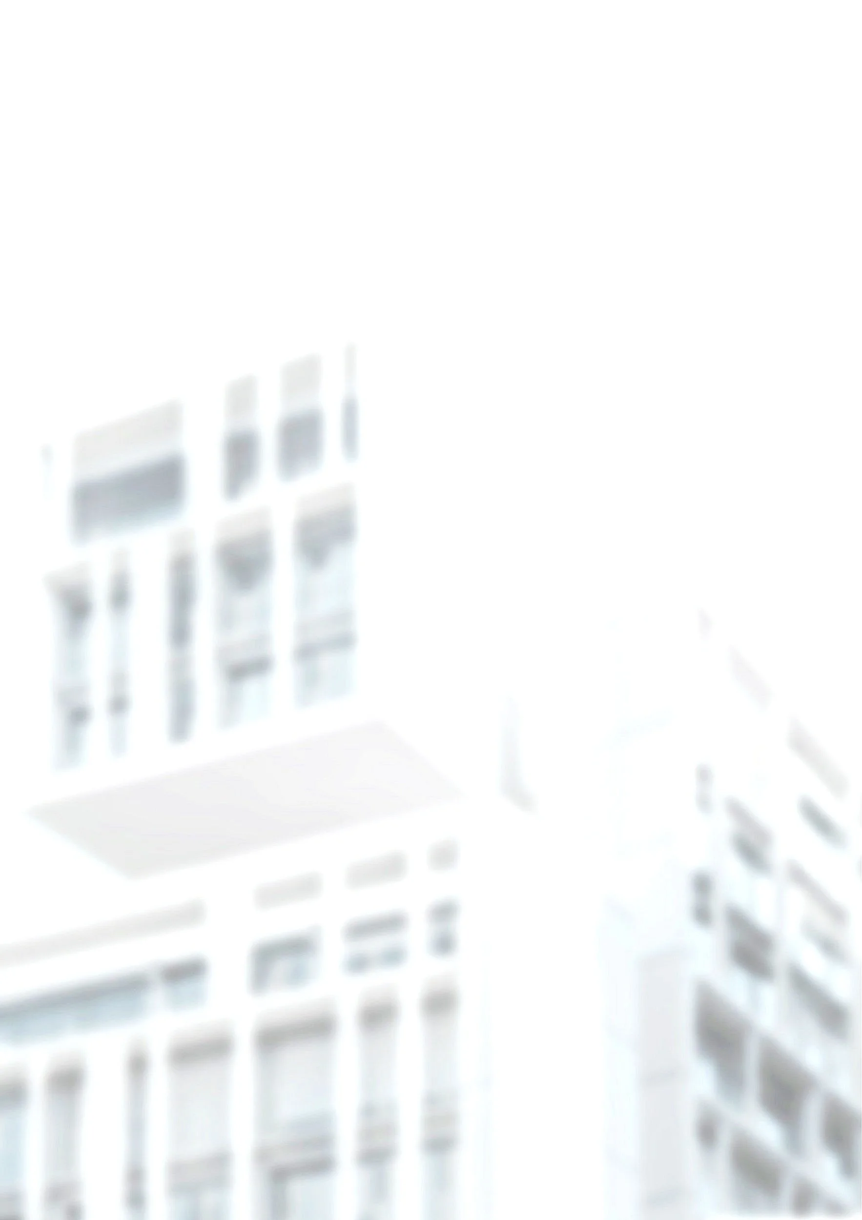 Blurred image of city buildings with modern architecture and glass windows.