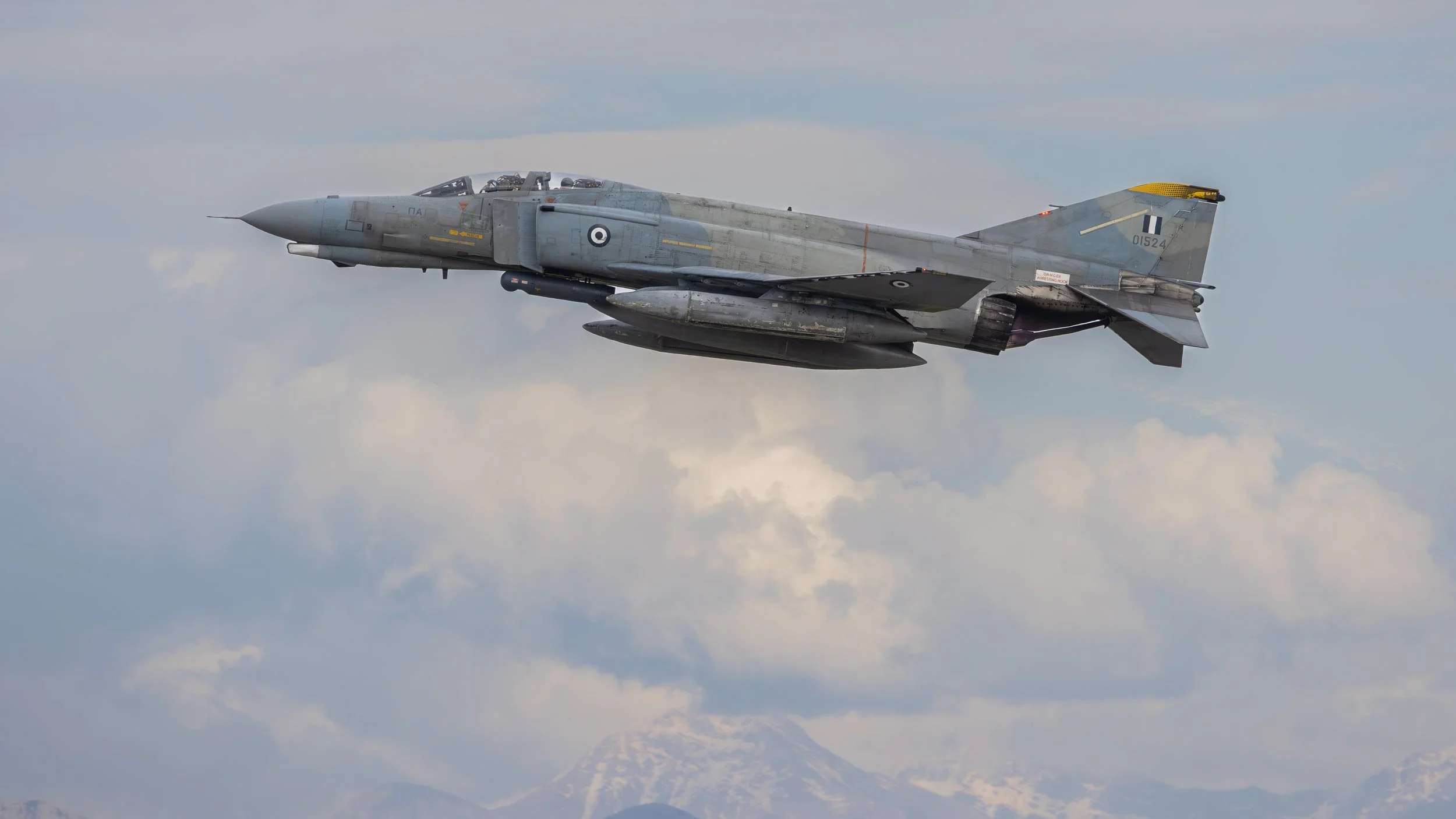 One of the last few Phantom IIs left in operational service, serial 01524 from 338 Mira, heads out to do battle. 