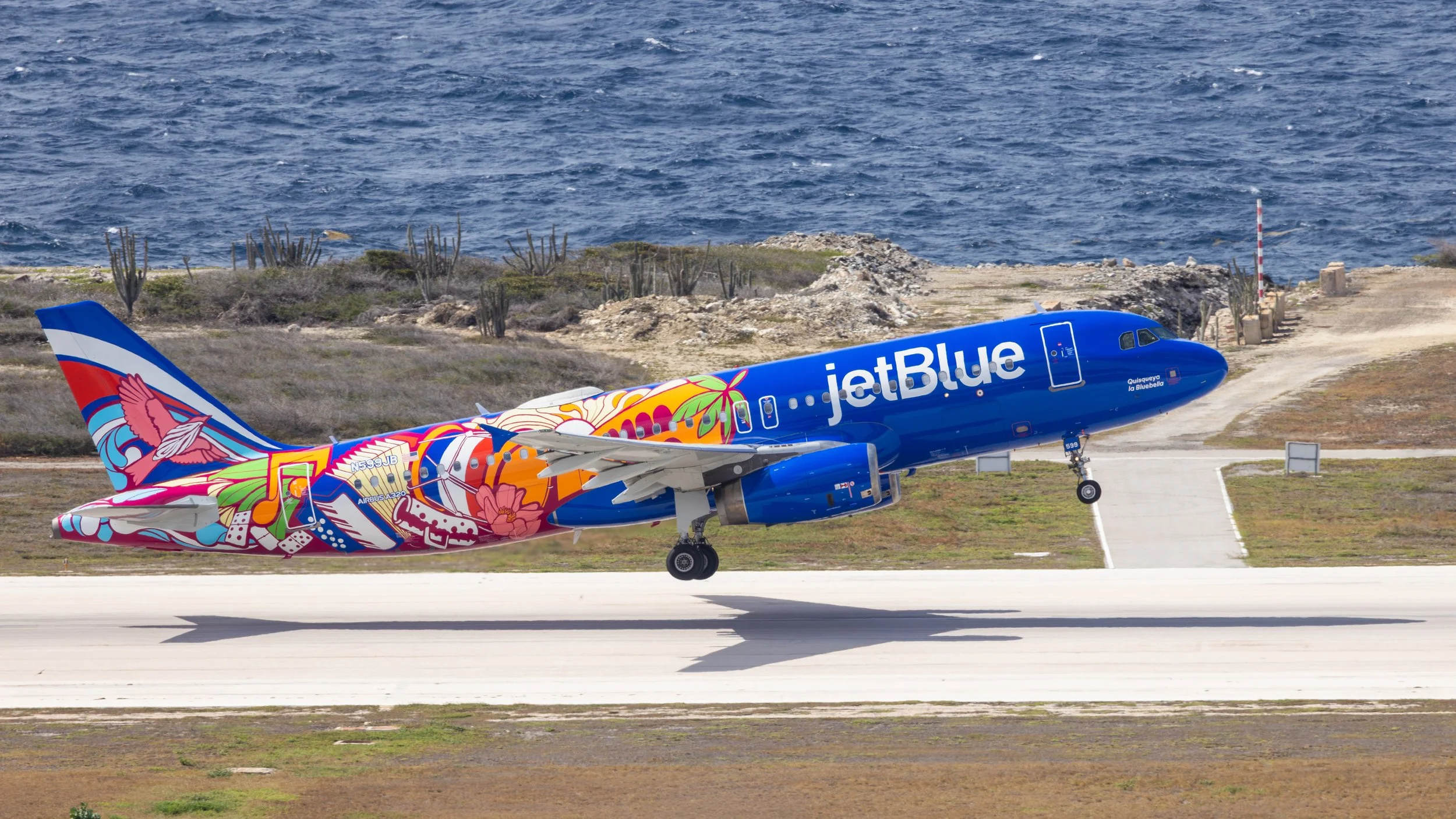 JetBlue Airbus A320-232 N599JB Dominican Republic Special livery departs Curacao TNCC for New York June 2026