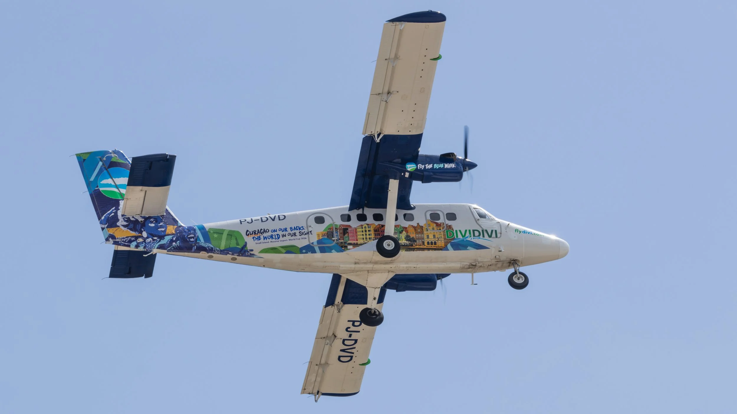 Divi Divi Air DeHavilland Canada DHC-6 Twin Otter PJ-DVD with its news "fly the blue wave" special 2026 World Cup livery arrives from Aruba June 2026