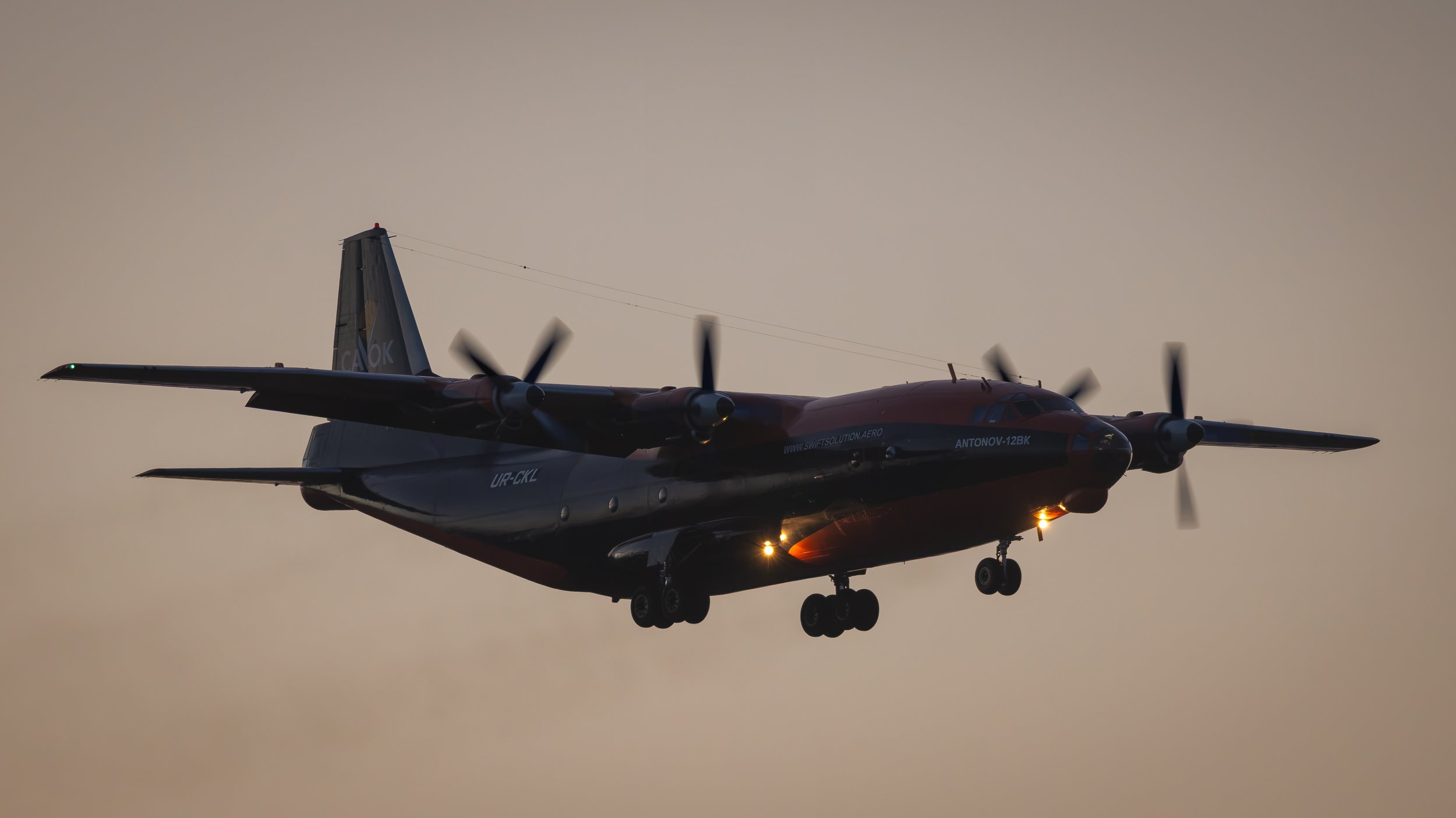 CAVOK Antonov AN-12BK UR-CKL Transatlantic Routing Ends with Sunset Arrival at Curaçao