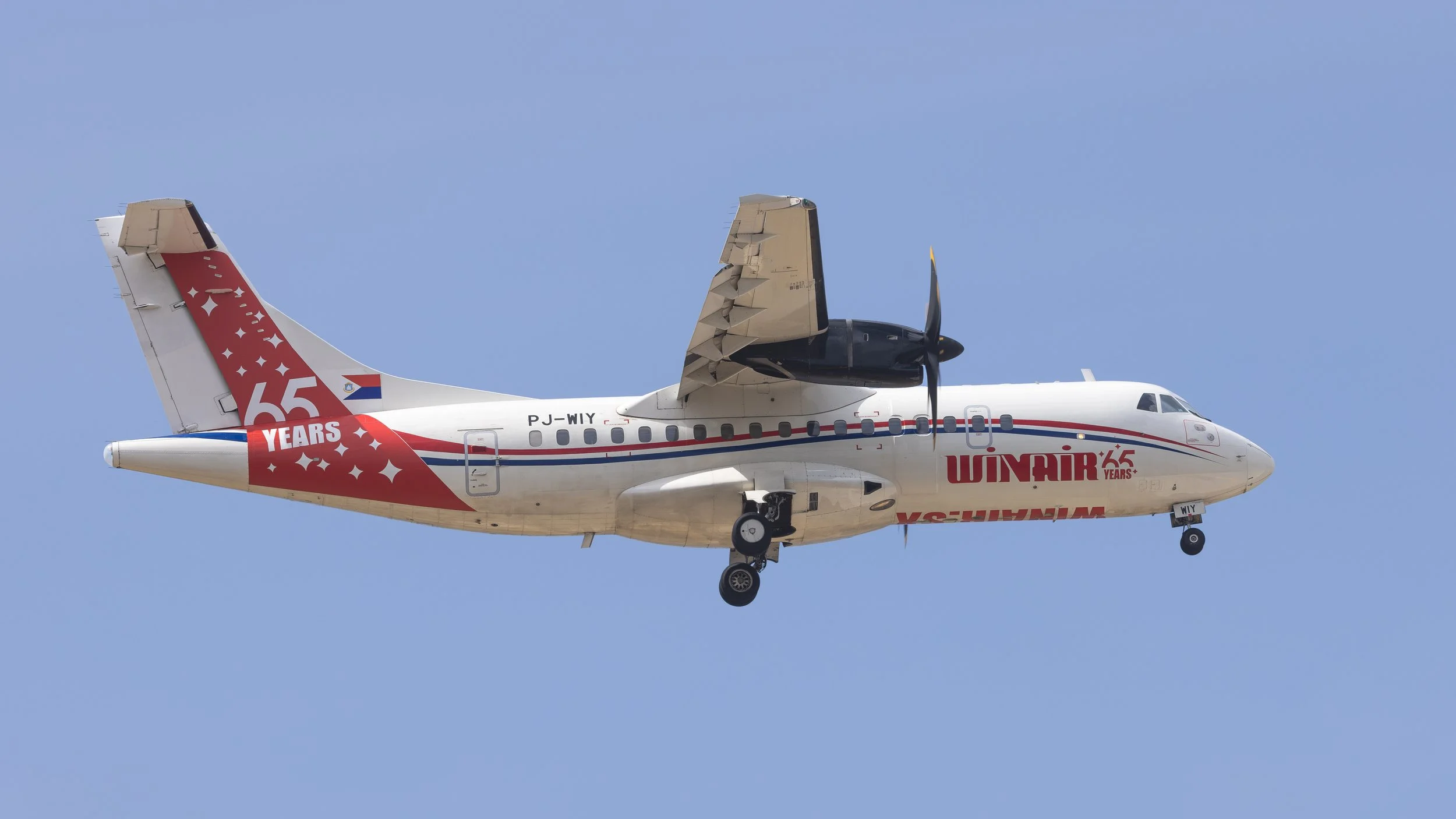 Winair 65th anniversary livery ATR 42-500 PJ-WIY taxies on final for the runwayl in Curacao TNCC 20 July 2026
