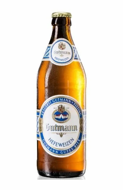 A bottle of Gutmann Hefewizen beer with a white and blue label, featuring a logo with a crown and a house.