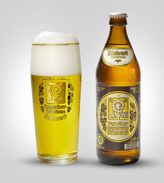 Beer bottle and a filled beer glass on a white background with labels featuring German text and a cartoon character.