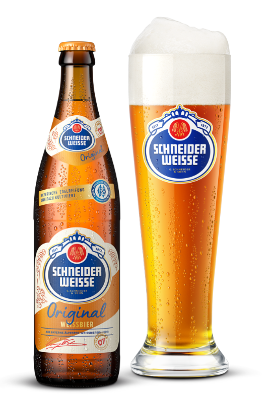 A bottle of Schneider Weisse Original wheat beer next to a tall glass filled with the beer with foam on top.