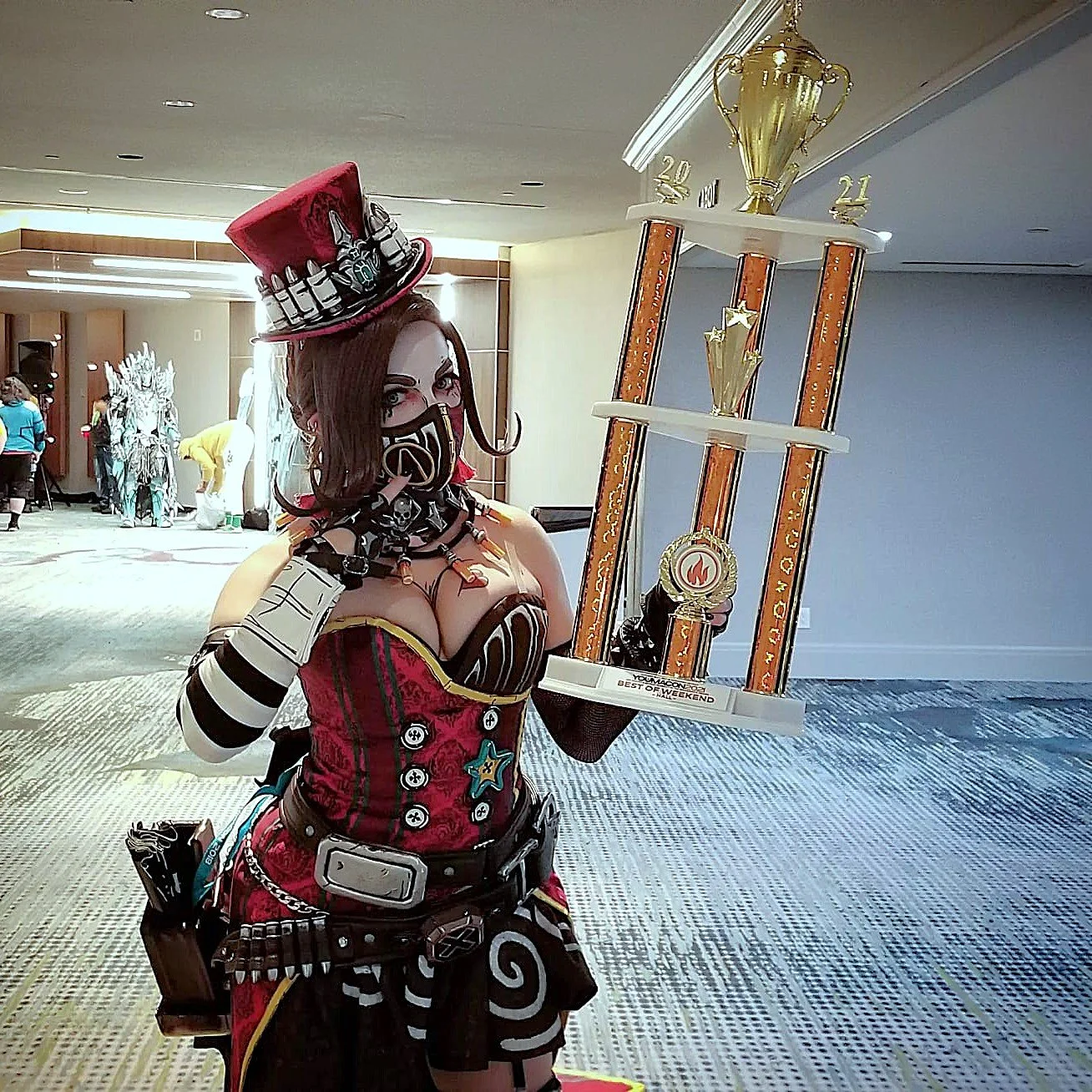 I was busy making sure we ended 2021 strong. I never got around to sharing the good news. This year at Youmacon my Borderlands  Mad Moxxi cosplay took home "Best of Weekend". This is one Big-Ass-Trophy!
I worked hard to finish up all the extras that 