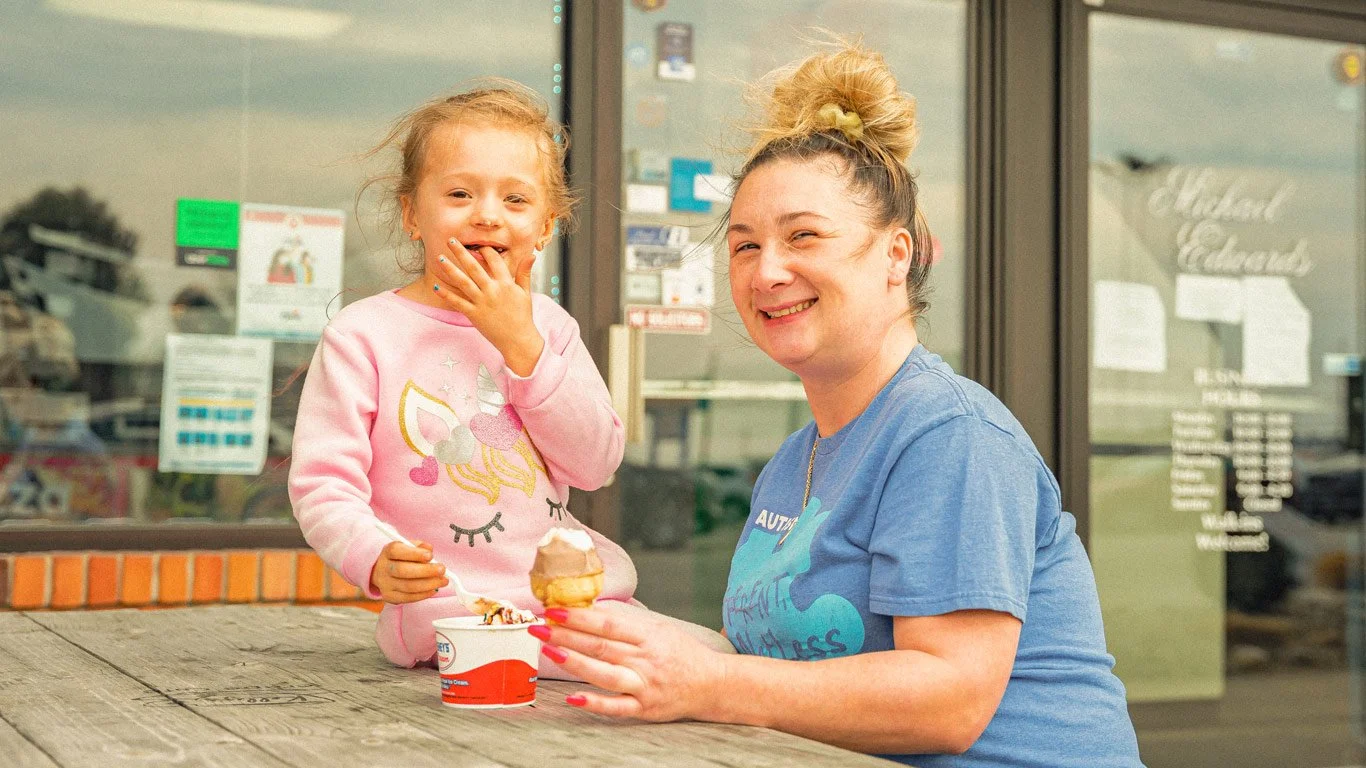Customers attending a community event at Giovanni's Pizza.