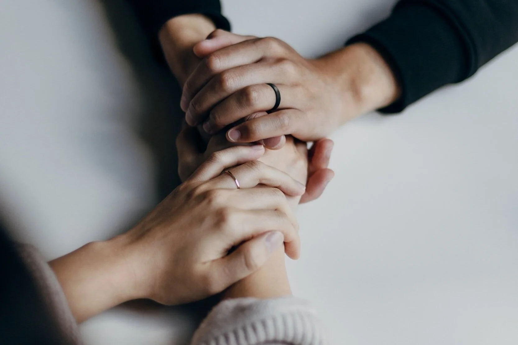 holding hands in therapy coaching