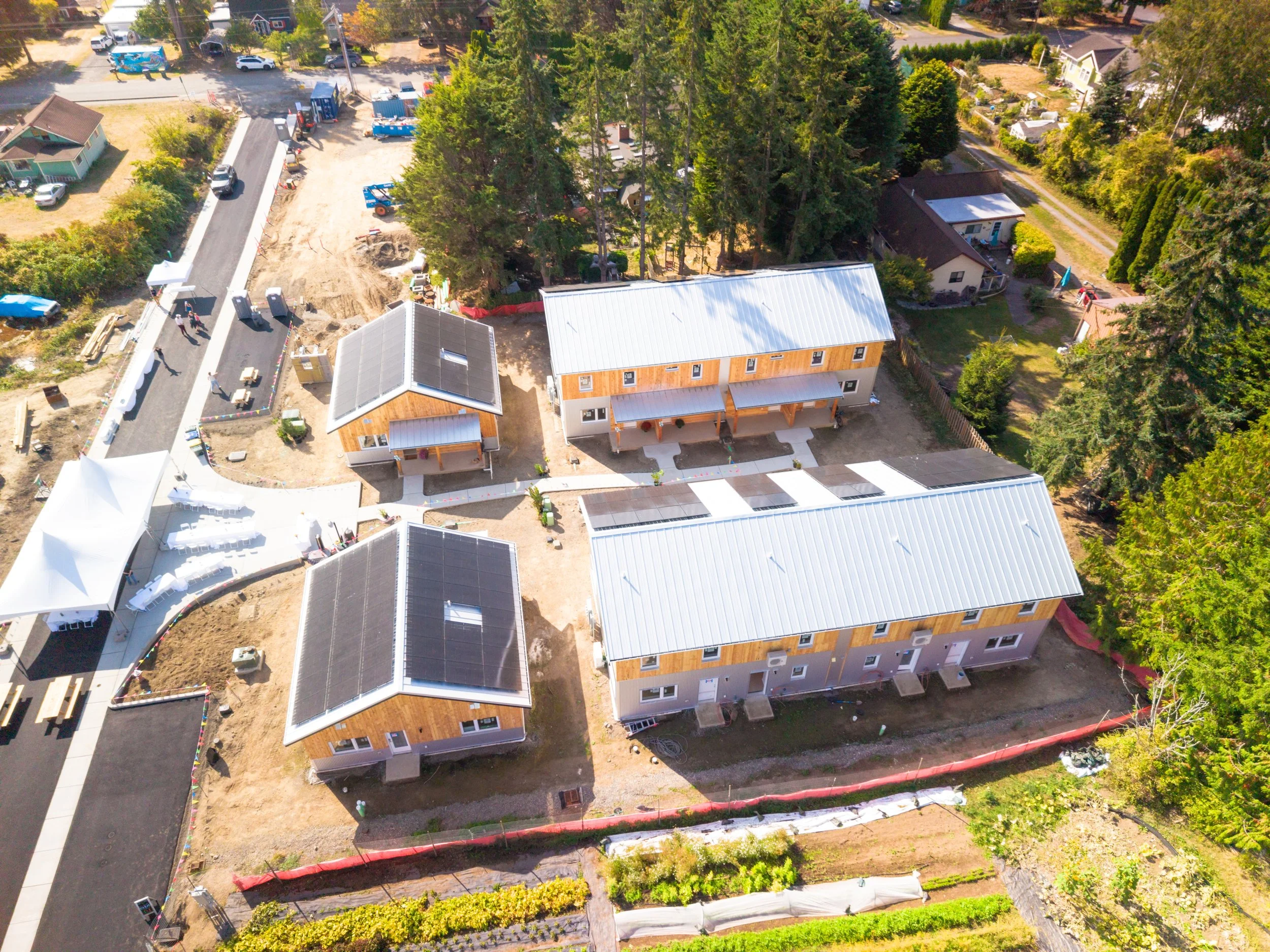 South-facing ariel view of KCLT's LaFreniere Court development's west-side eight townhomes and two ADA single family homes.