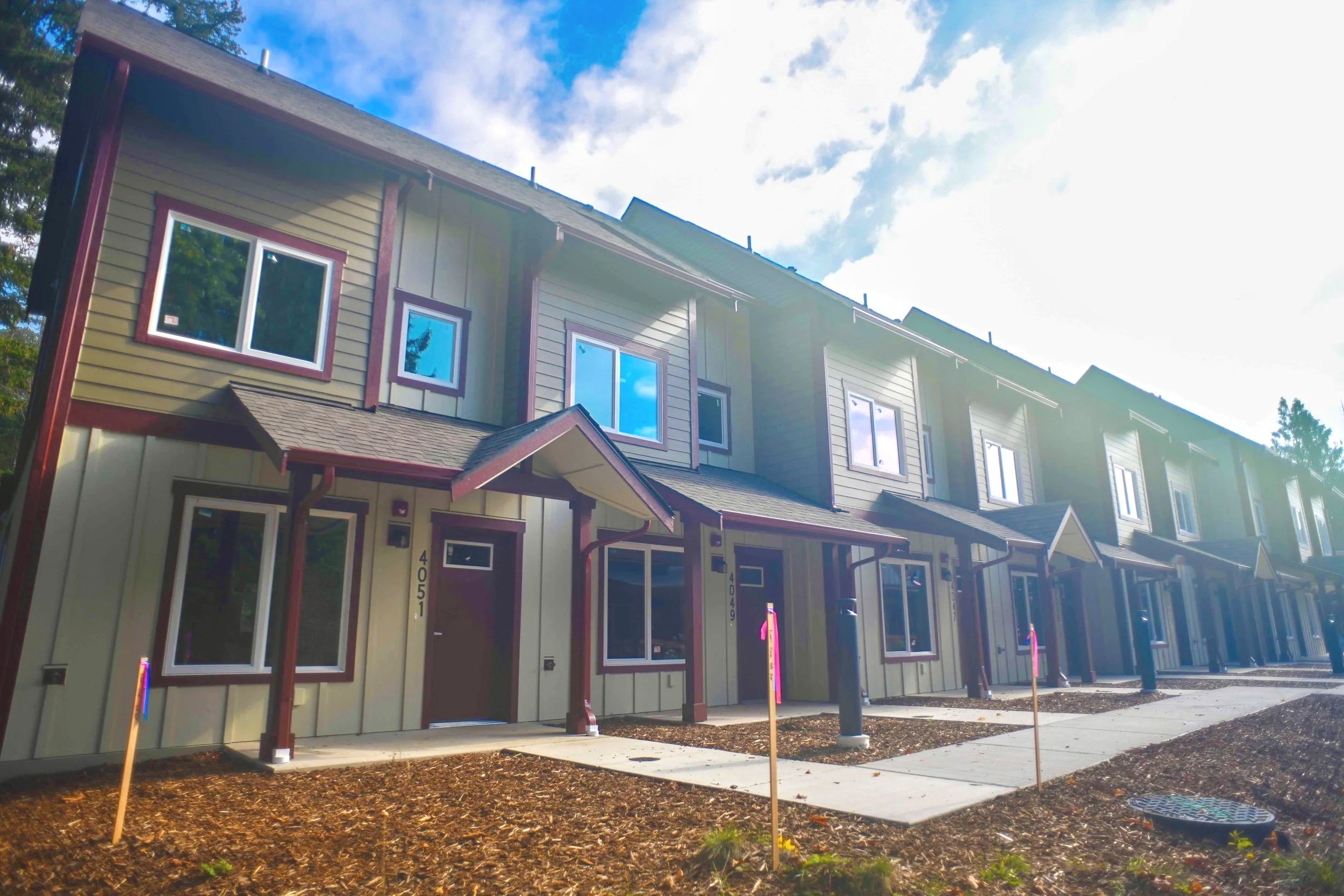 West-facing view of Telegraph Townhomes front facades.