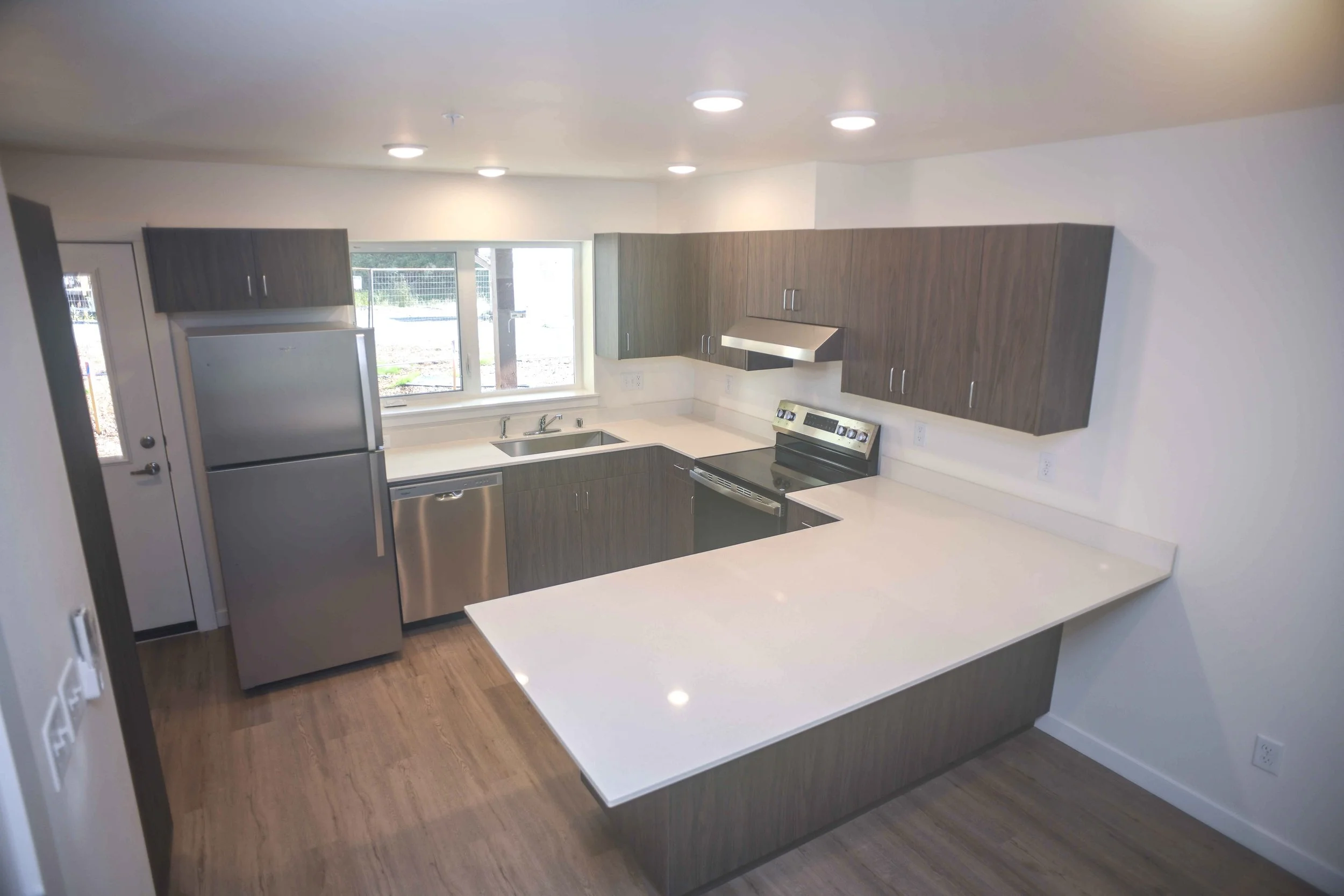 Interior view of Telegraph Townhomes 1D kitchen.