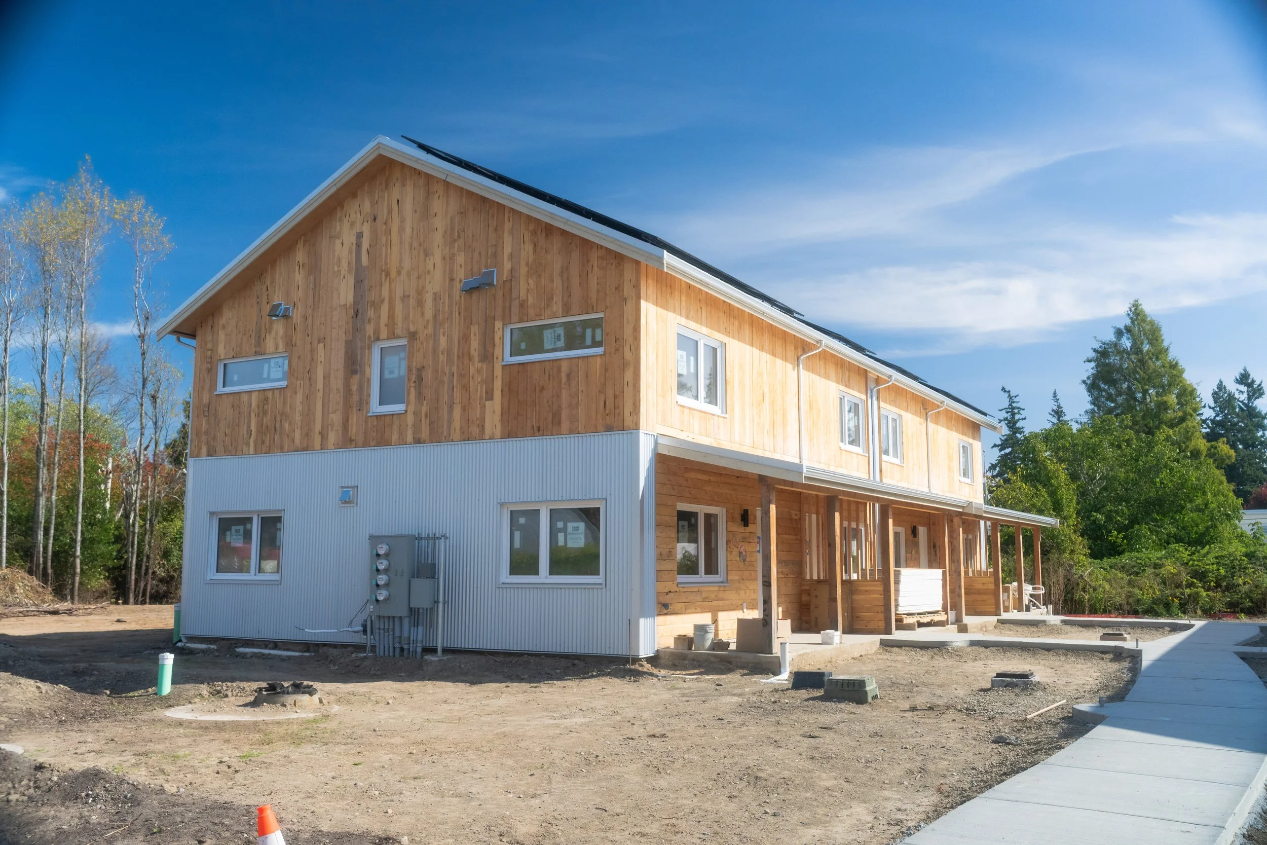 Full ground view of north-eastern most quad of townhomes at LaFreniere Court.