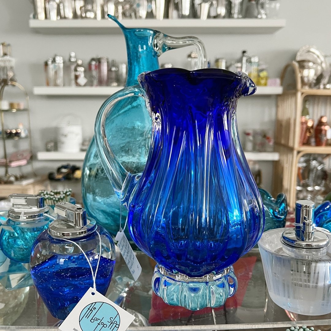 Mom loves a conversation starter. These vintage Murano glass pitchers and lighters invite chit chat through their history, beauty and functionality. Open Wednesday - Sunday this week! 

#melangeosterville #shopmelange #vintagebarware #shoposterville 