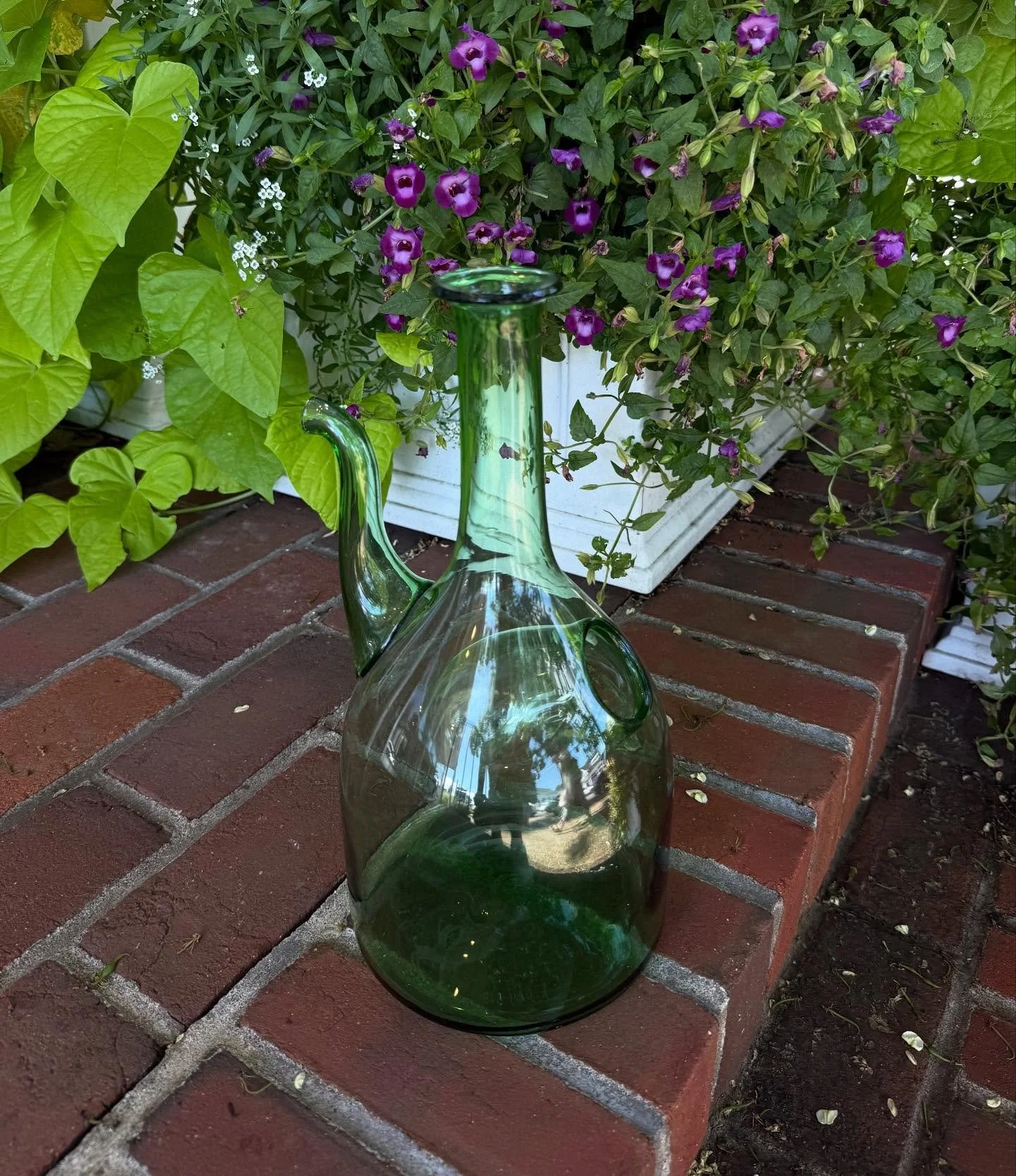 Have you heard of the Porr&oacute;n? It&rsquo;s a traditional Spanish wine pitcher designed for communal drinking! Its long spout allows for wine to be poured directly into one&rsquo;s mouth without touching the vessel. This vintage 1970&rsquo;s Span