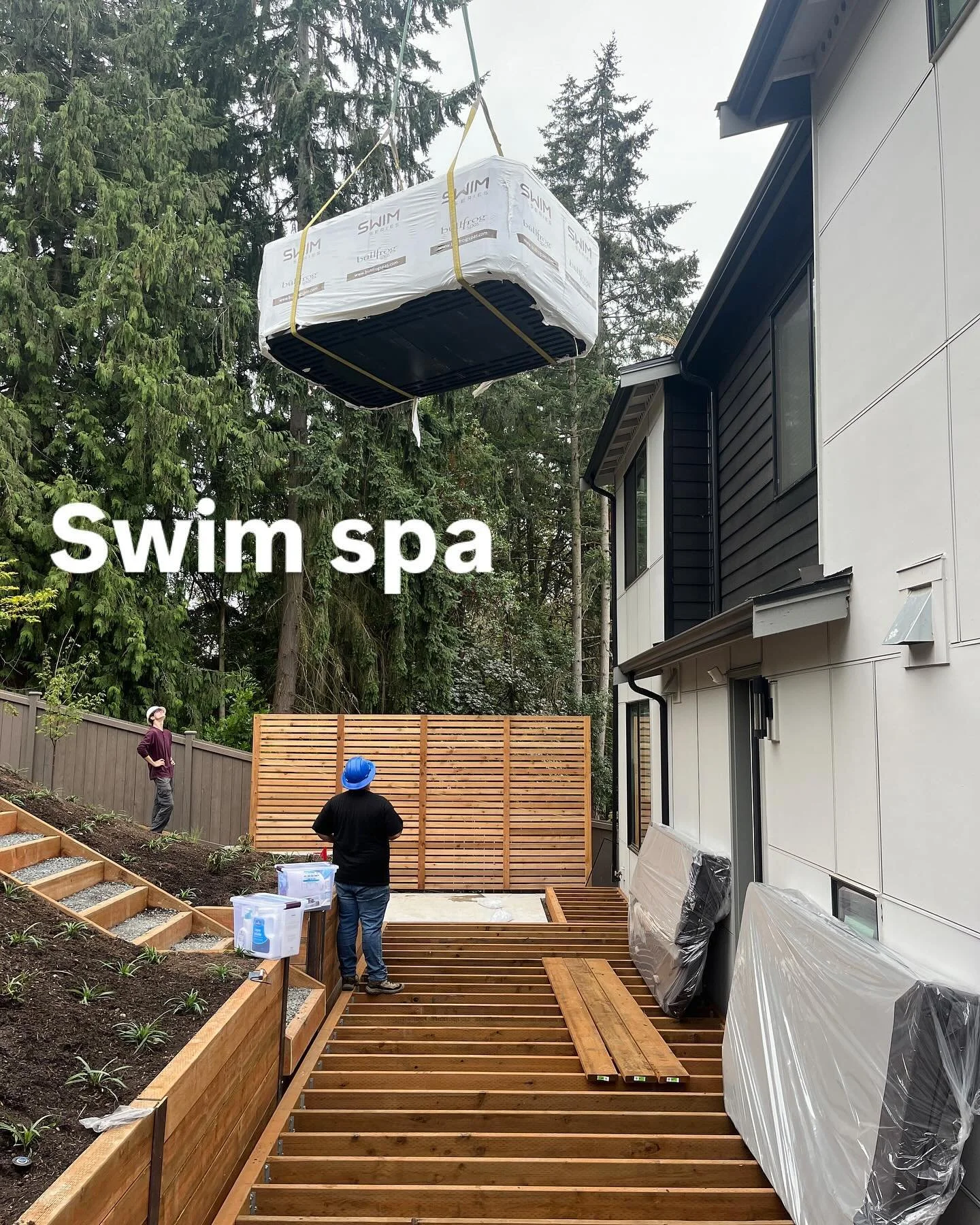 It was a big week for our Bellevue deck project. The hot tub was craned in over the residence! Special thanks to JP Landscapes making sure framing was complete and Jared with @hottubsnw for the perfect Swim spa placement.