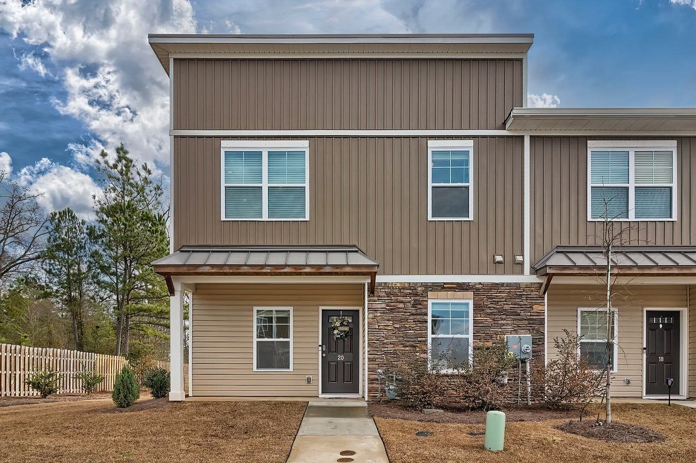Welcome to Harbison Grove, a newer development that has beautiful townhomes throughout. This unit is only one of three that has the primary bedroom on the main level! Meticulously maintained, this townhome is one of a kind. With assigned parking dire