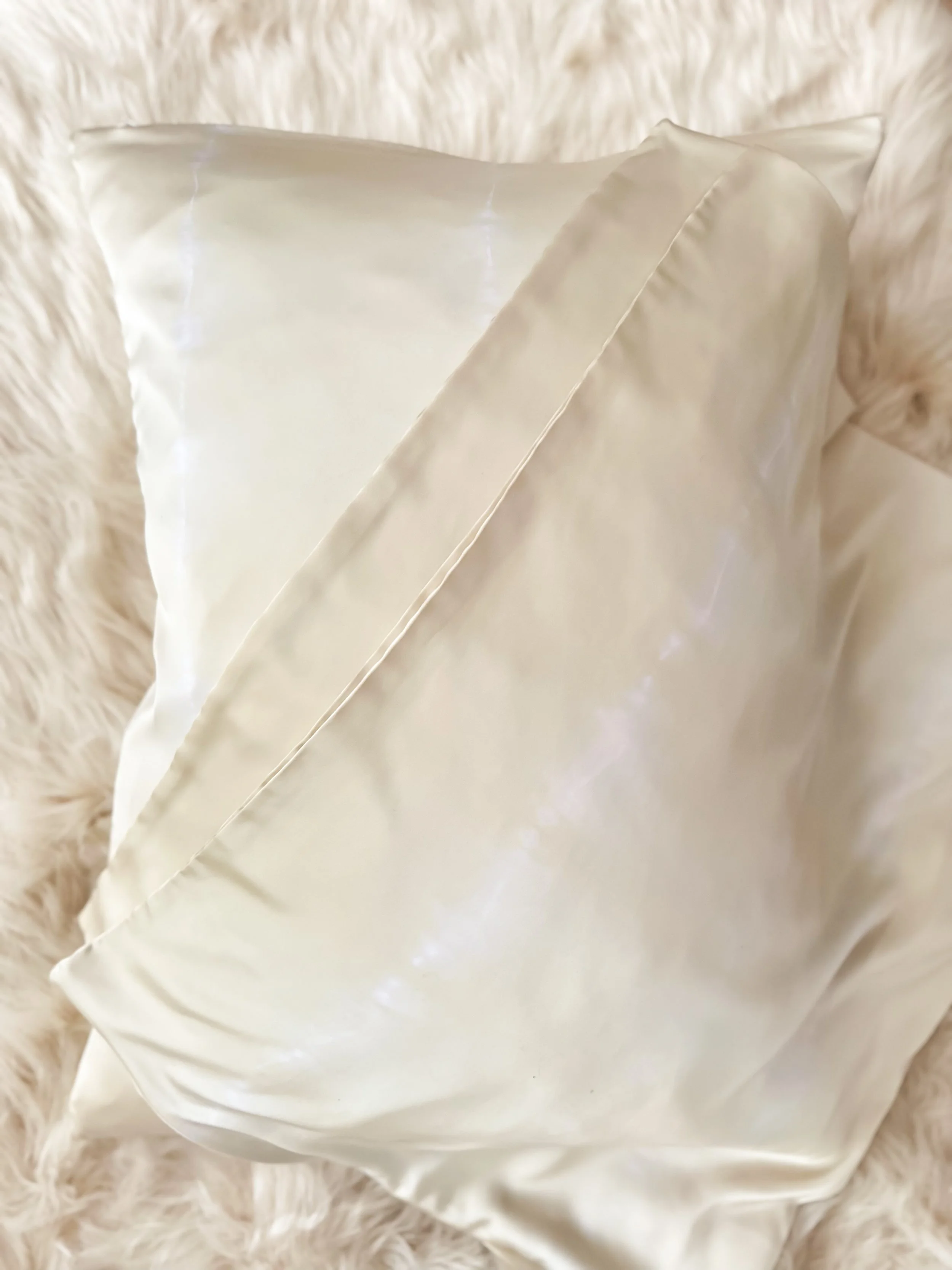 100% mulberry silk pillowcase, hand-tied, hand-dyed, standard size, hidden zipper. Beneficial for hair and skin health, breathable and hypoallergenic for better sleep. Small-batch made.