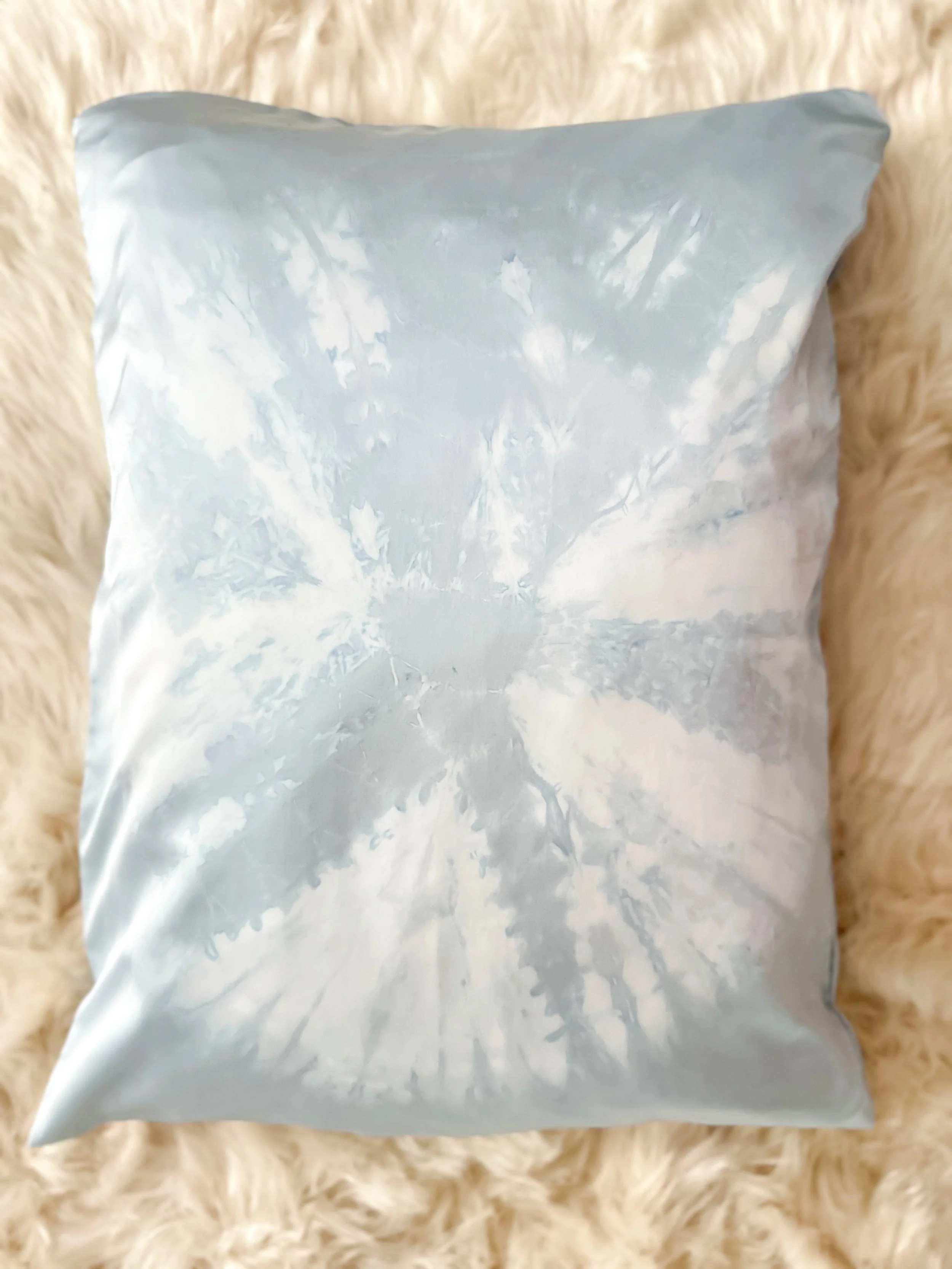 100% mulberry silk pillowcase, hand-tied, hand-dyed, standard size, hidden zipper. Beneficial for hair and skin health, breathable and hypoallergenic for better sleep. Small-batch made.