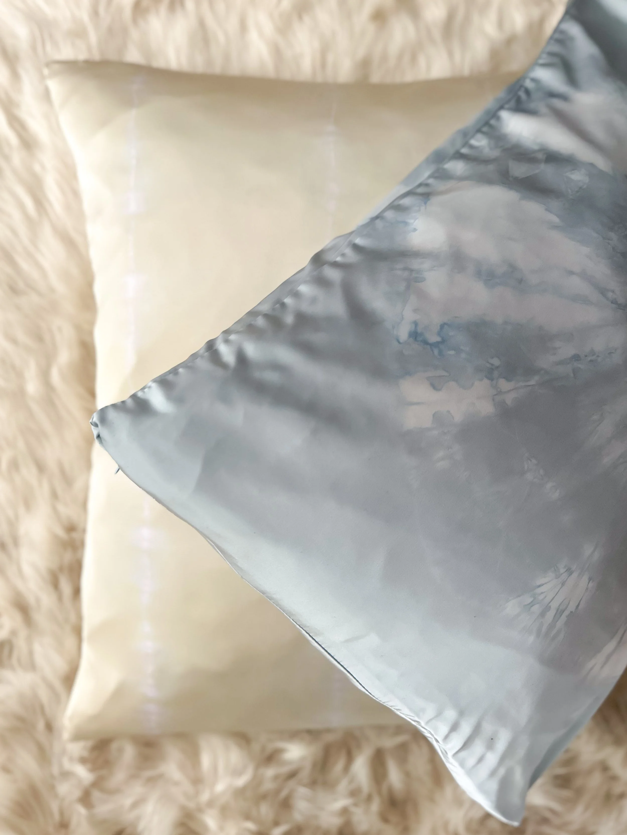 100% mulberry silk pillowcase, hand-tied, hand-dyed, standard size, hidden zipper. Beneficial for hair and skin health, breathable and hypoallergenic for better sleep. Small-batch made.