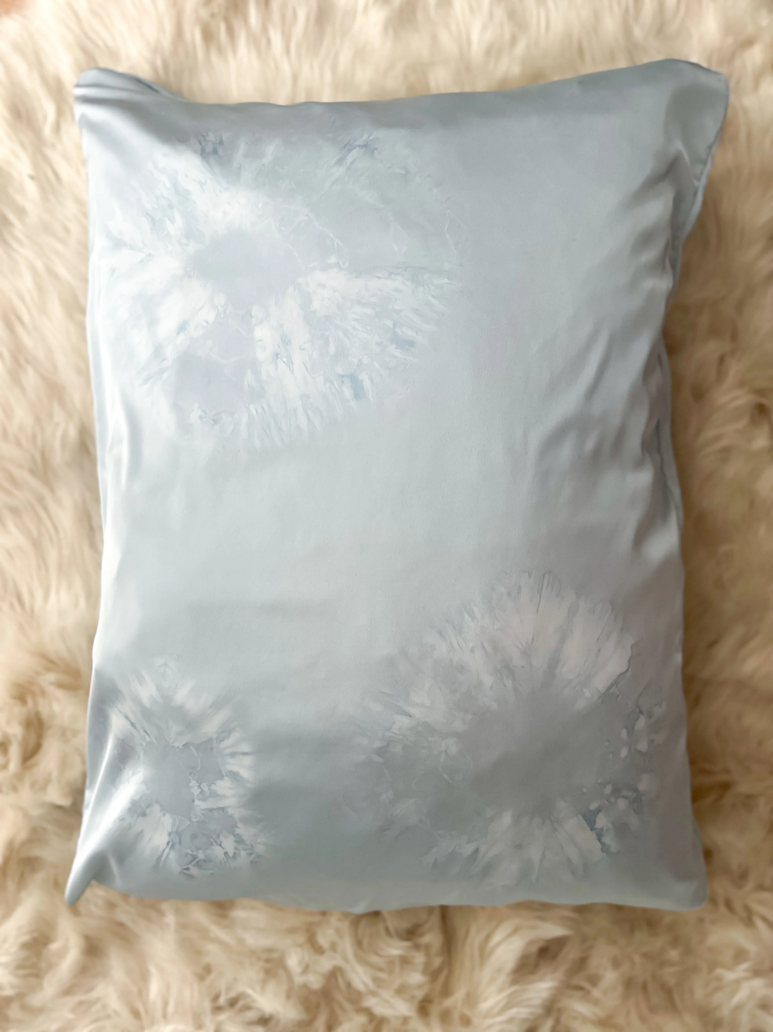 100% mulberry silk pillowcase, hand-tied, hand-dyed, standard size, hidden zipper. Beneficial for hair and skin health, breathable and hypoallergenic for better sleep. Small-batch made.