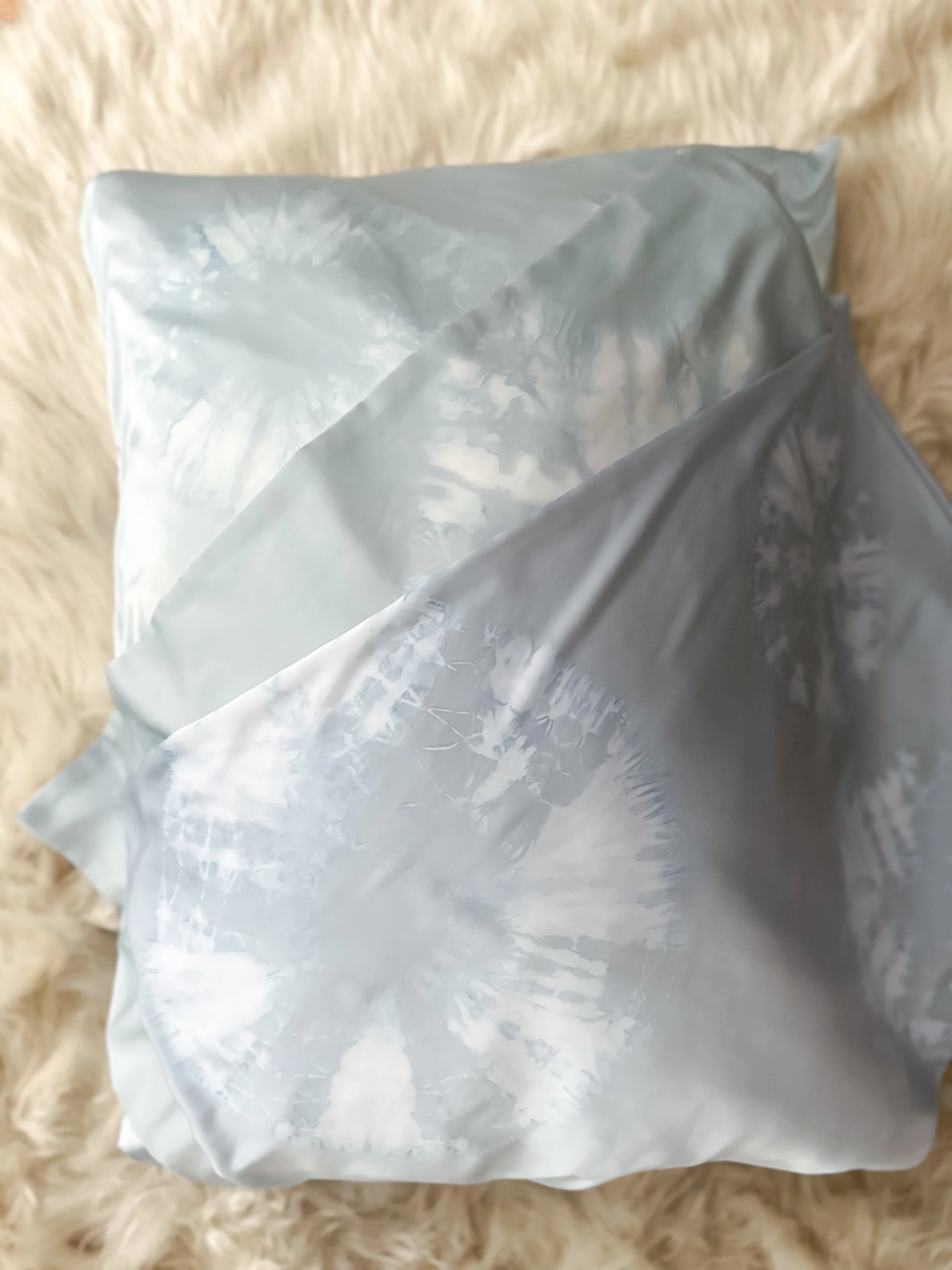 100% mulberry silk pillowcase, hand-tied, hand-dyed, standard size, hidden zipper. Beneficial for hair and skin health, breathable and hypoallergenic for better sleep. Small-batch made.