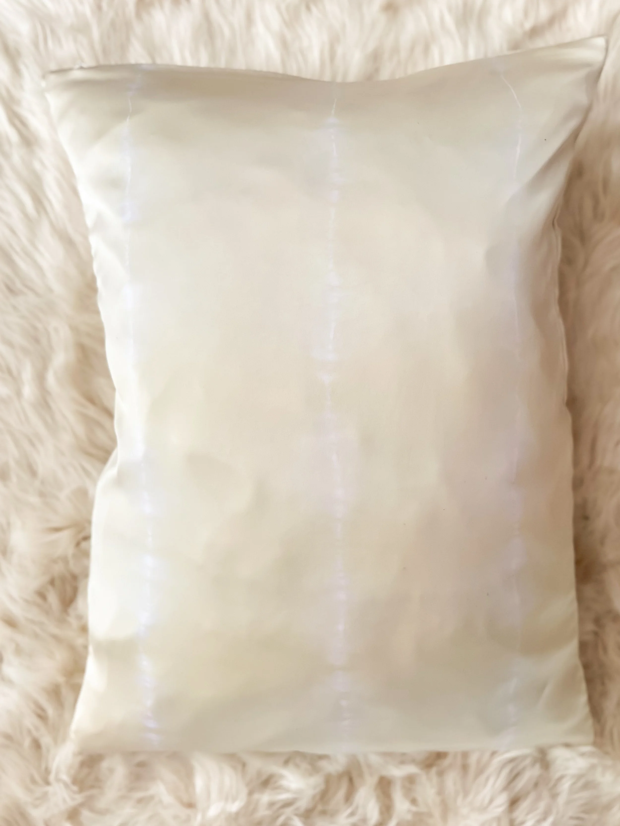 100% mulberry silk pillowcase, hand-tied, hand-dyed, standard size, hidden zipper. Beneficial for hair and skin health, breathable and hypoallergenic for better sleep. Small-batch made.