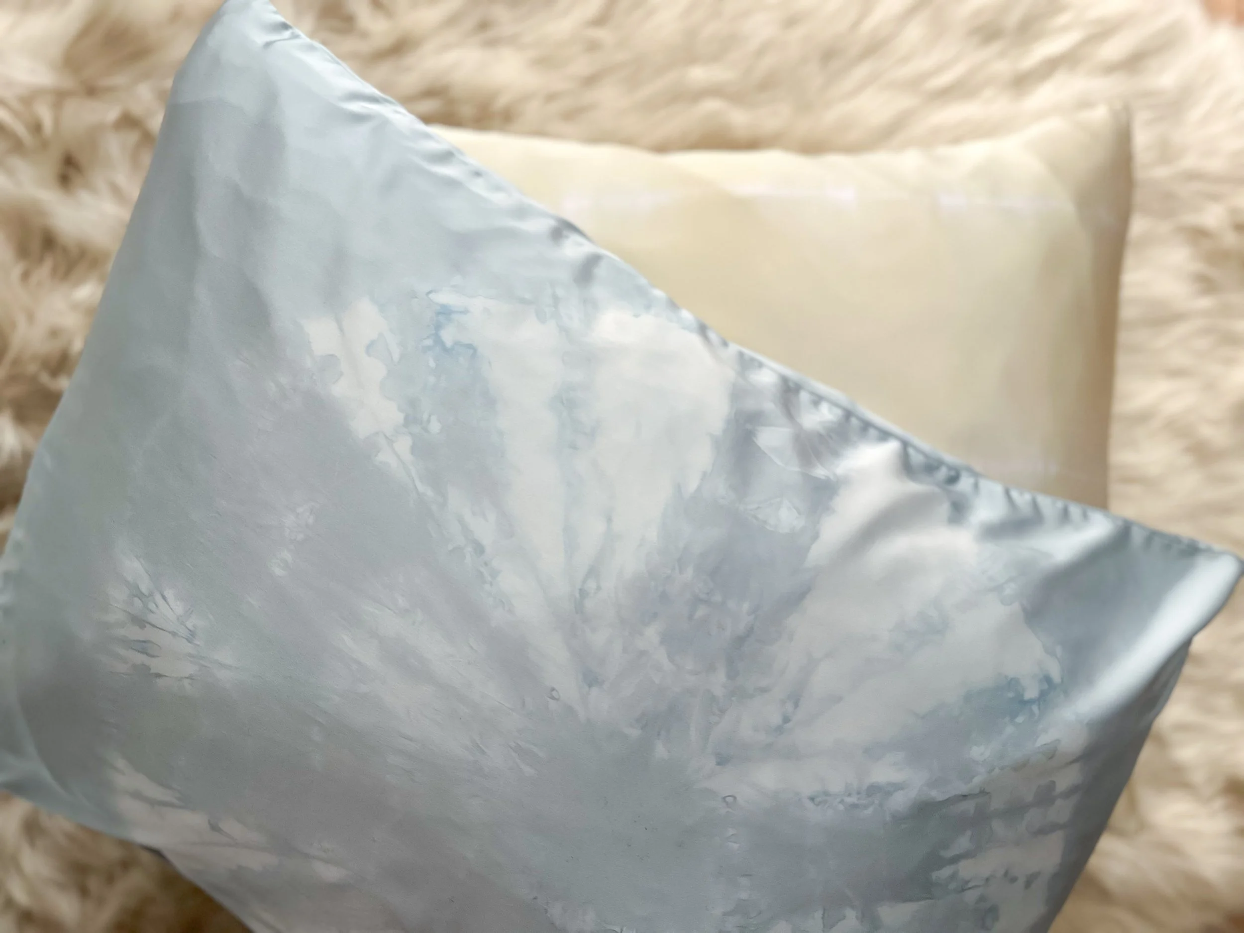 100% mulberry silk pillowcase, hand-tied, hand-dyed, standard size, hidden zipper. Beneficial for hair and skin health, breathable and hypoallergenic for better sleep. Small-batch made.