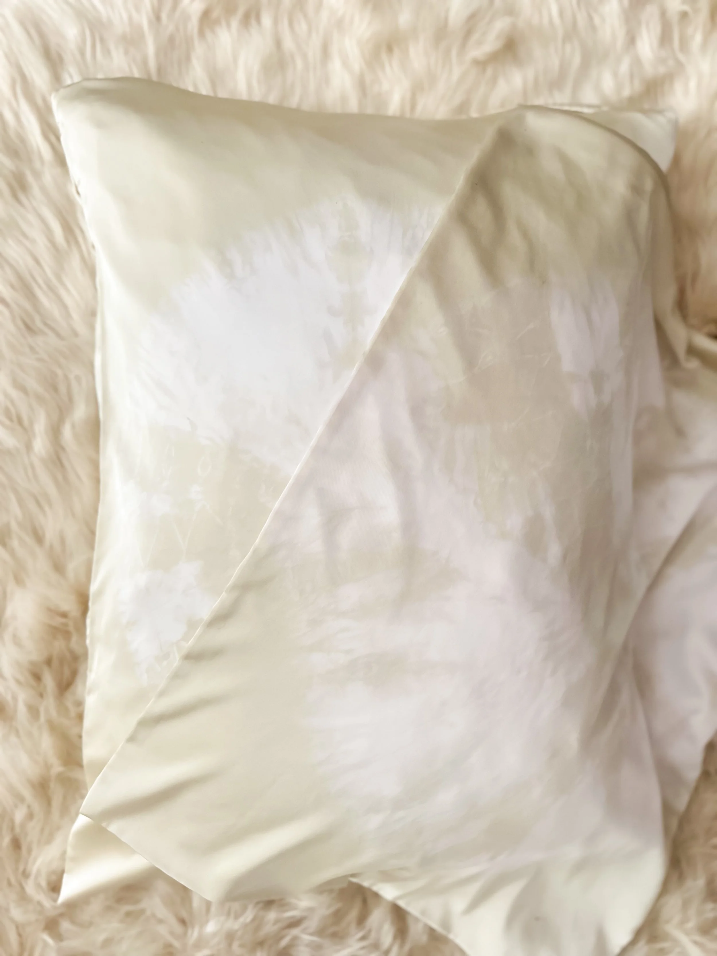 100% mulberry silk pillowcase, hand-tied, hand-dyed, standard size, hidden zipper. Beneficial for hair and skin health, breathable and hypoallergenic for better sleep. Small-batch made.