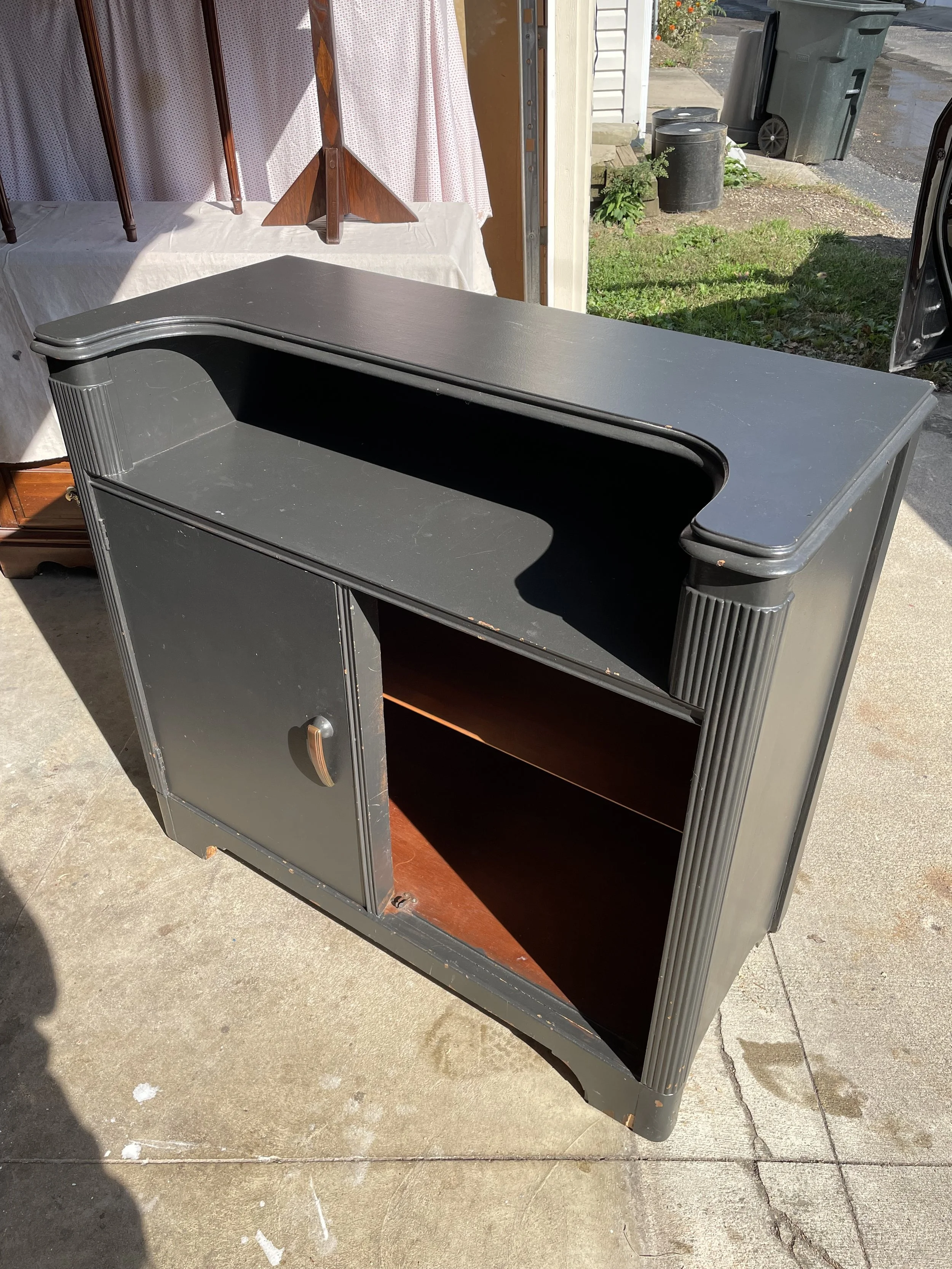 Painted bar cabinet before refinishing back to natural wood