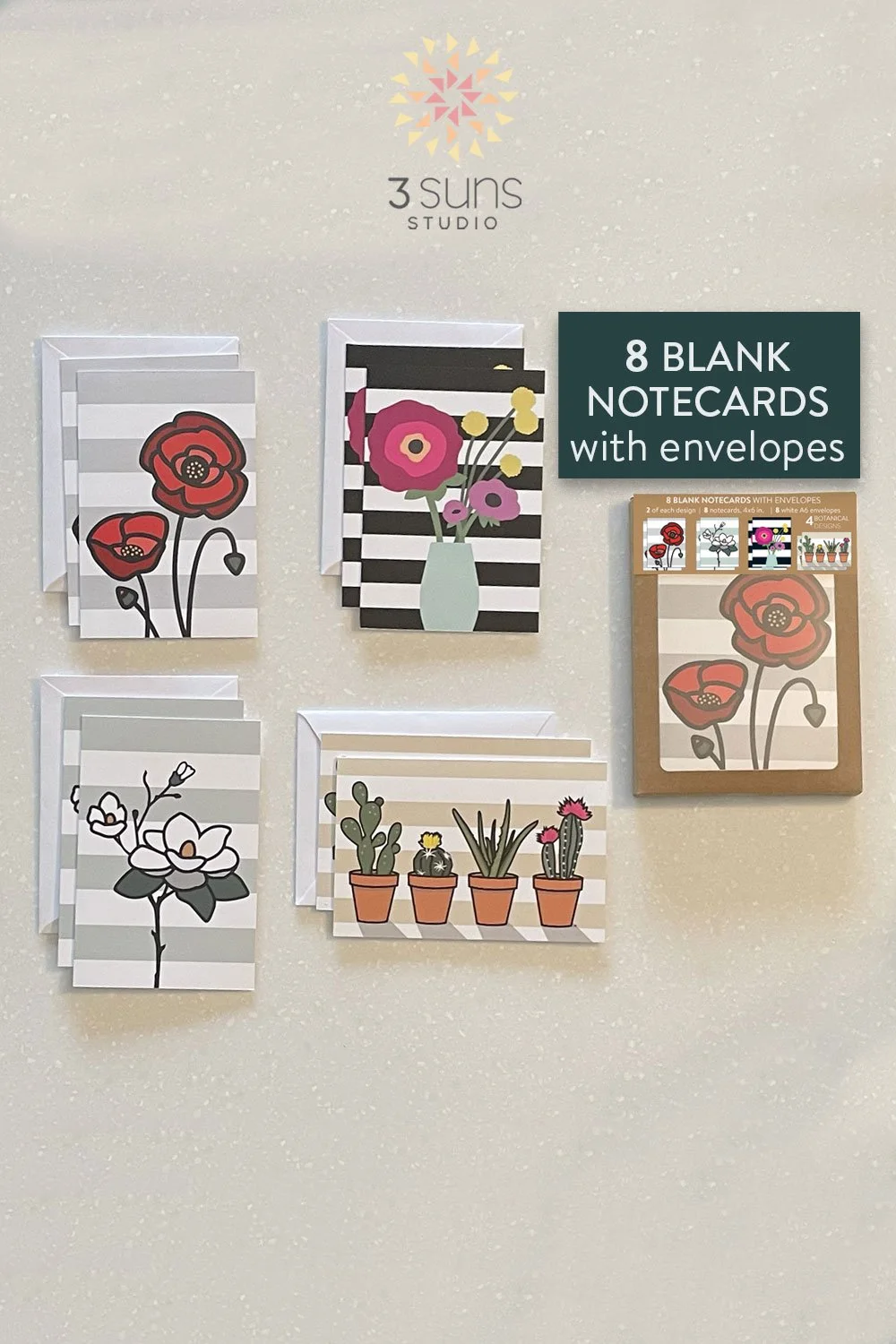 Set of 8 blank notecards, featuring 4 modern floral designs. Includes 8 white envelopes and packaged in a brown Kraft box with a window.
